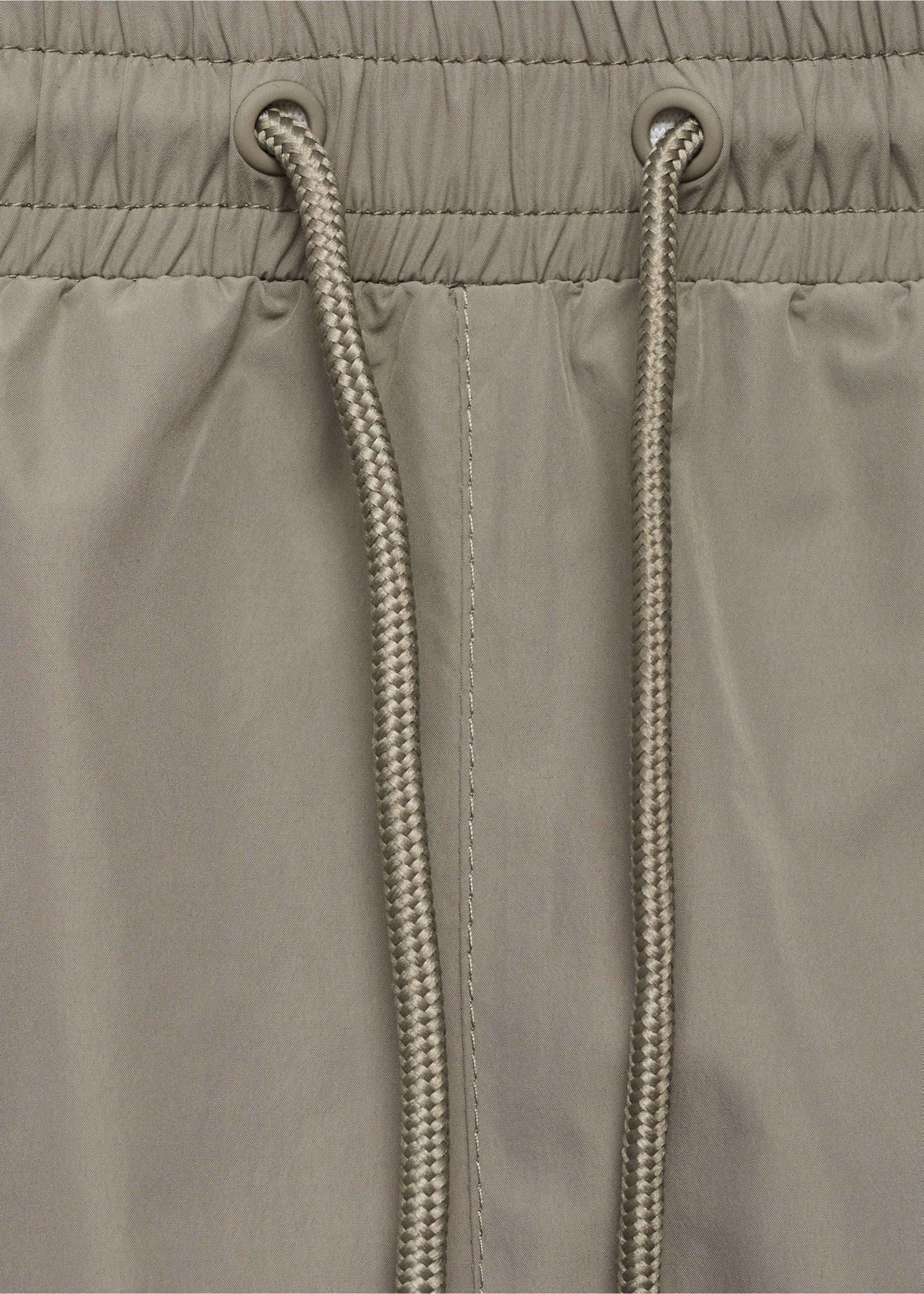 Swimsuit with zip pockets - Details of the article 8, Khaki. Ref: 17071146-00.