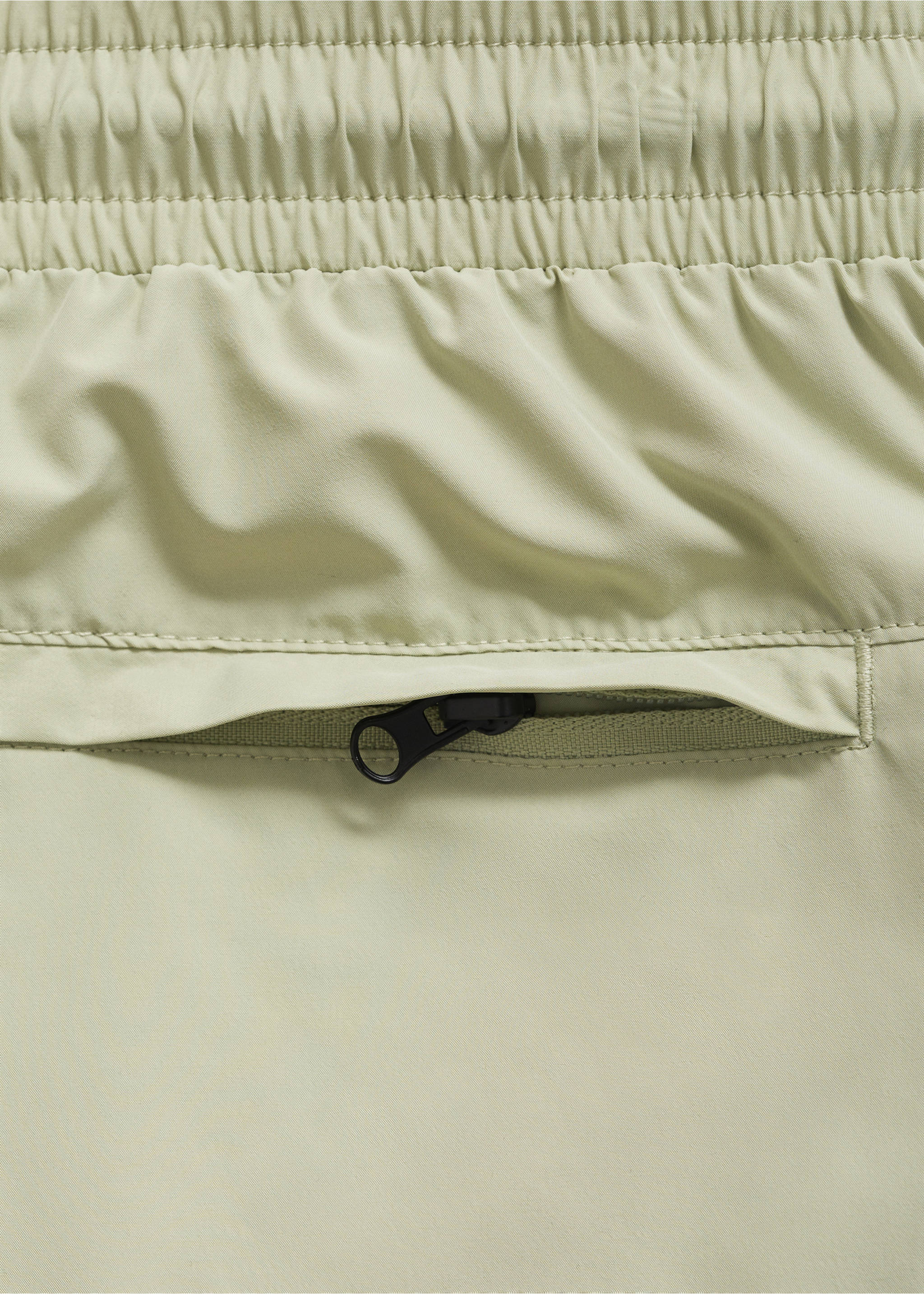 Swimsuit with zip pockets - Details of the article 0, Mint Green. Ref: 17071146-00.
