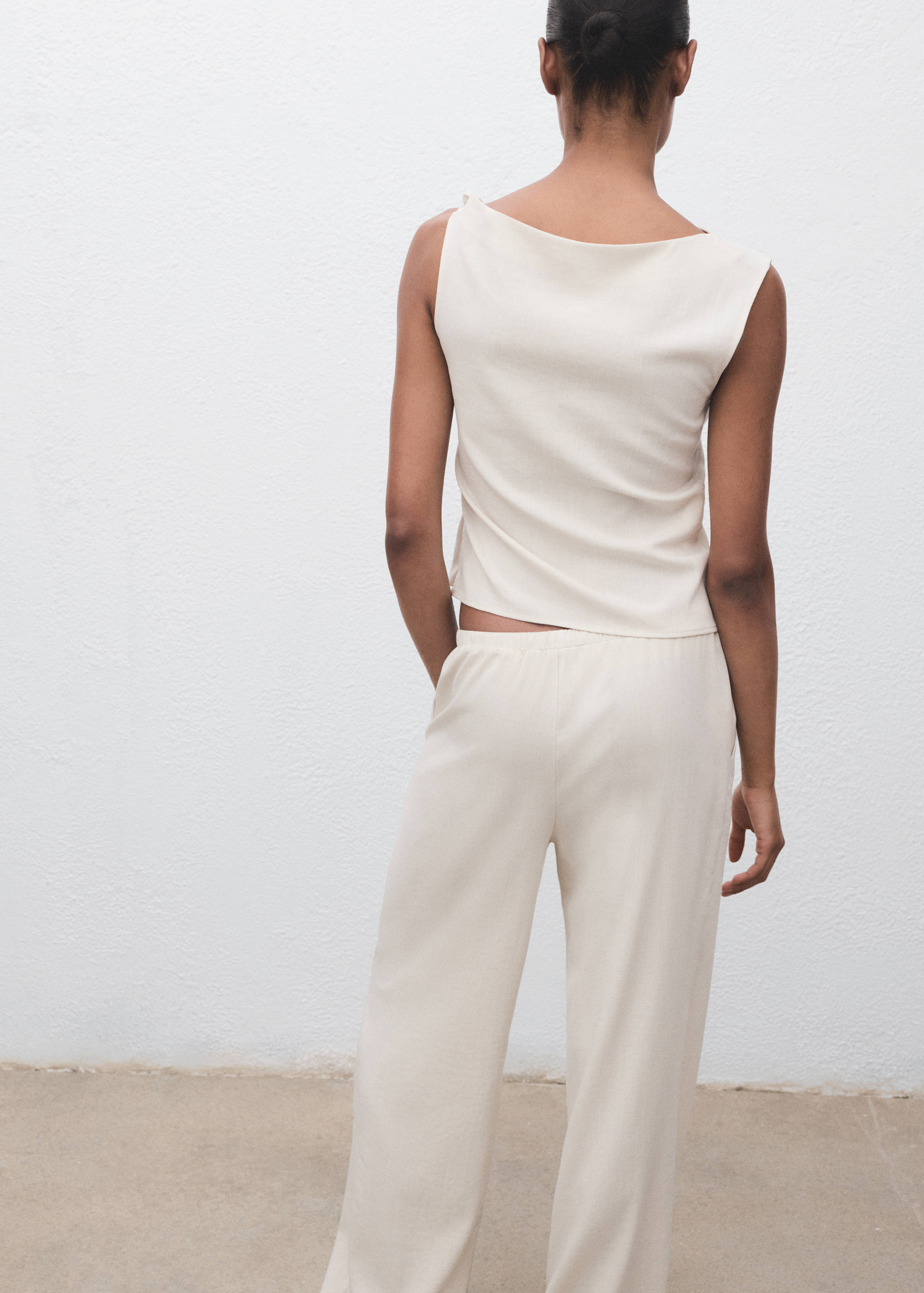 Asymmetrical draped top with straps - Reverse of the article