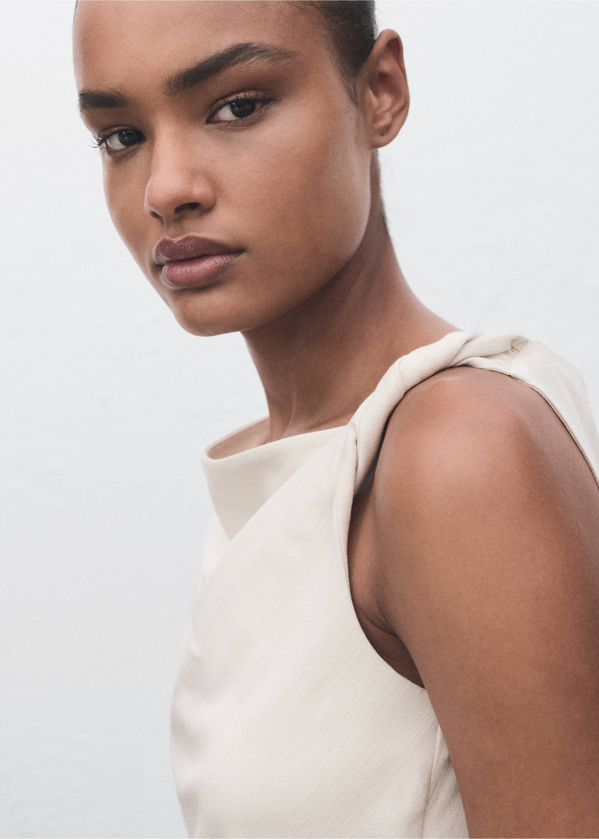 Asymmetrical draped top with straps - Details of the article 1, Ecru. Ref: 17071232-00.