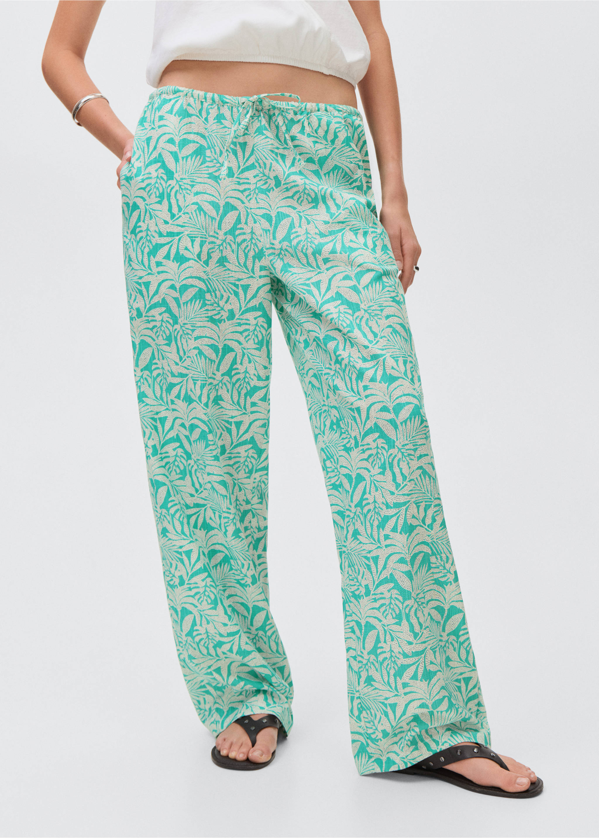 Cotton trousers with leaf pattern - Details of the article 6, Turquoise. Ref: 17071513-00.