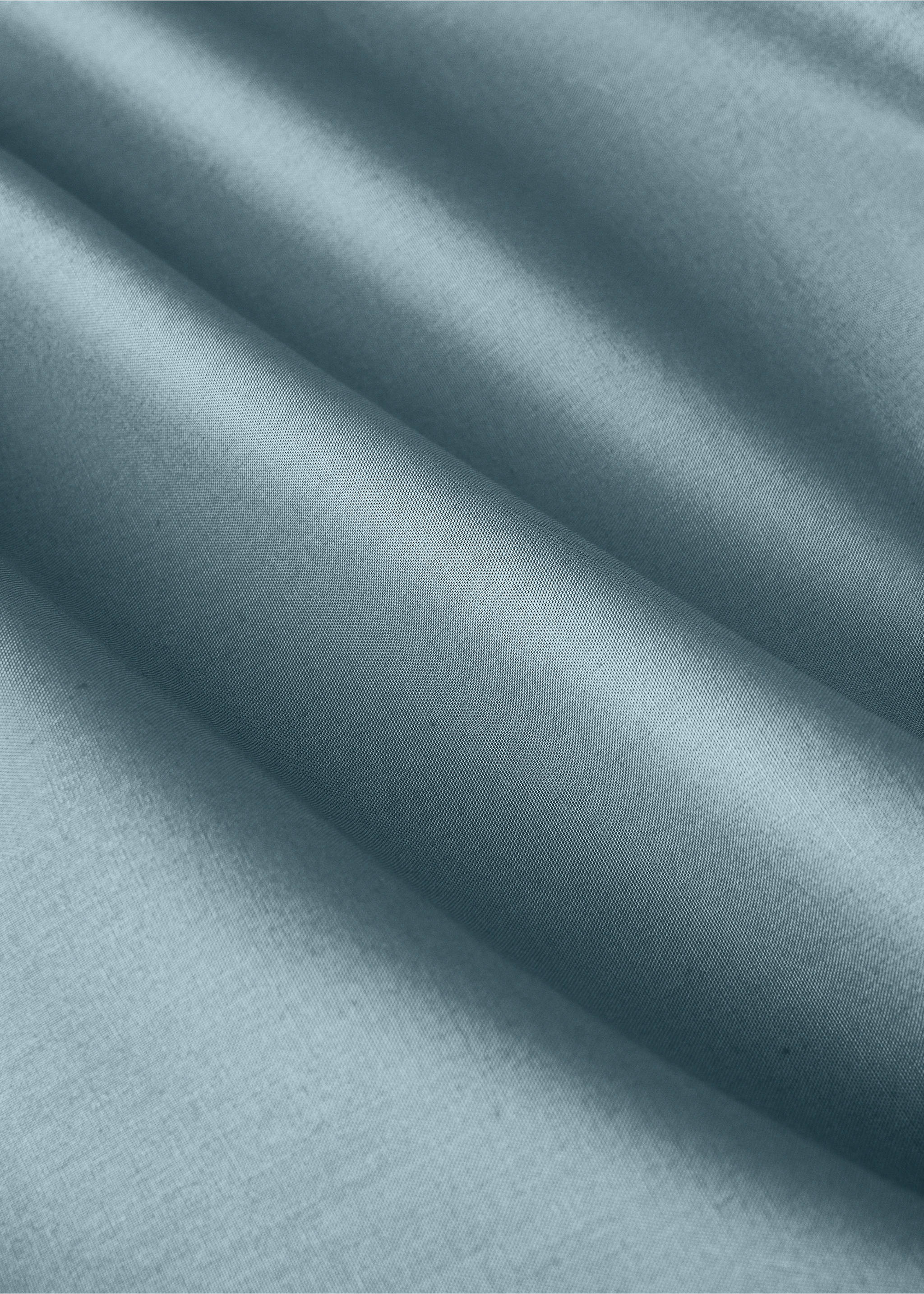 Light blue-grey cot fitted sheet, shown in close-up., Blue. Ref: 17071545-00.