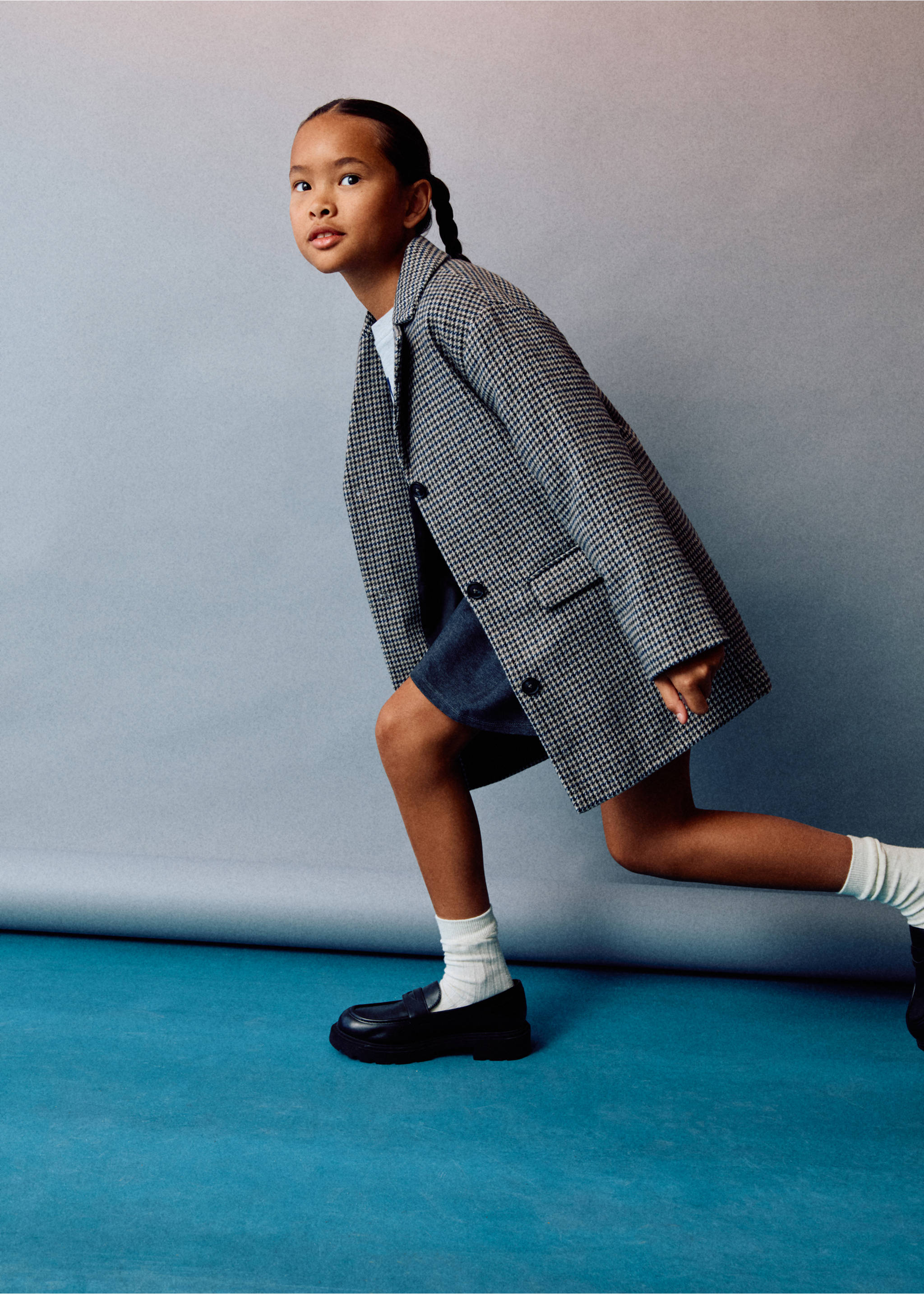 Black chunky loafers with a ridged sole worn with white socks., Black. Ref: 17073288-00.