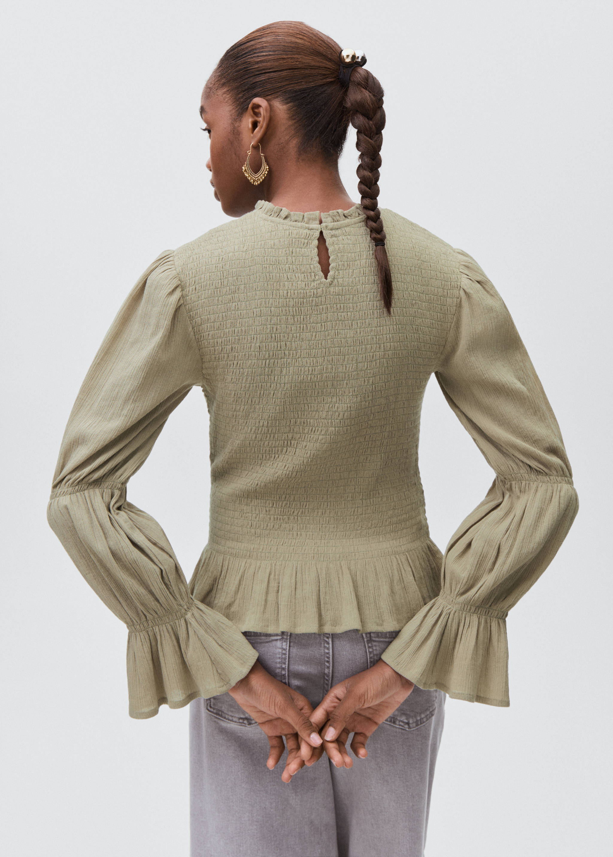 Ruched blouse with ruffles - Reverse of the article