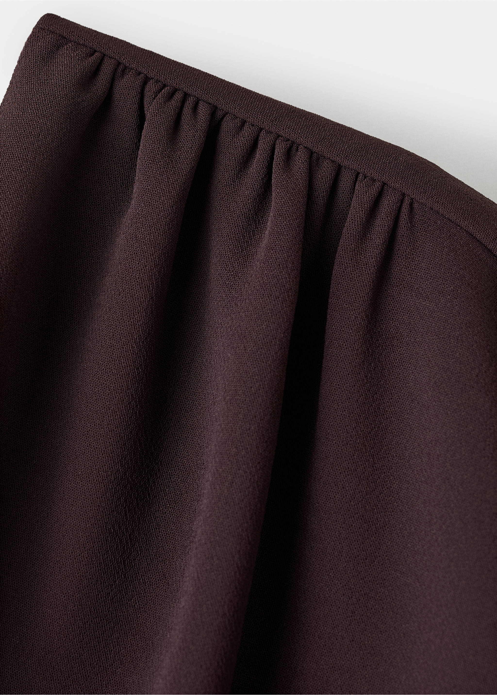 Jumpsuit with asymmetrical neck and bow - Details of the article 8, Brown. Ref: 17074145-00.