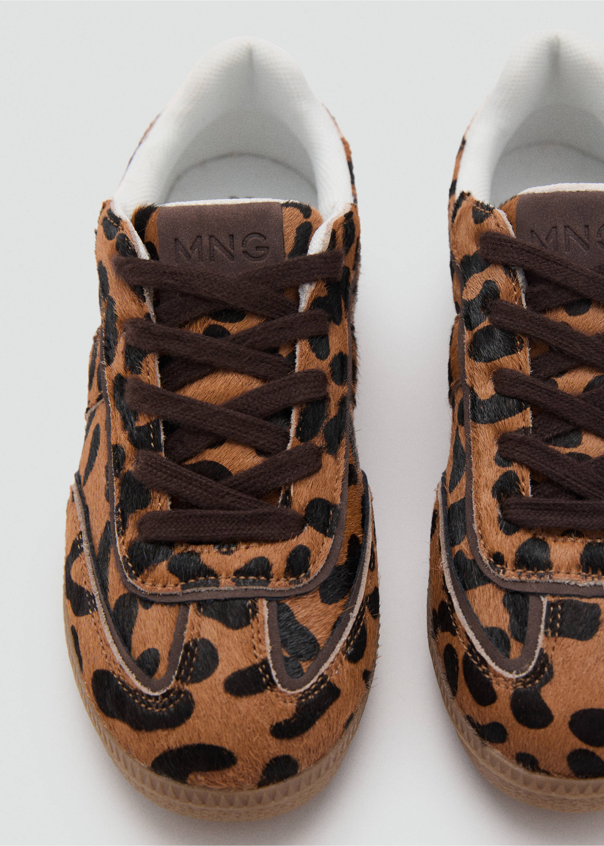 Leopard print faux-fur trainers with brown laces and MNG logo patch., Black. Ref: 17074421-00.