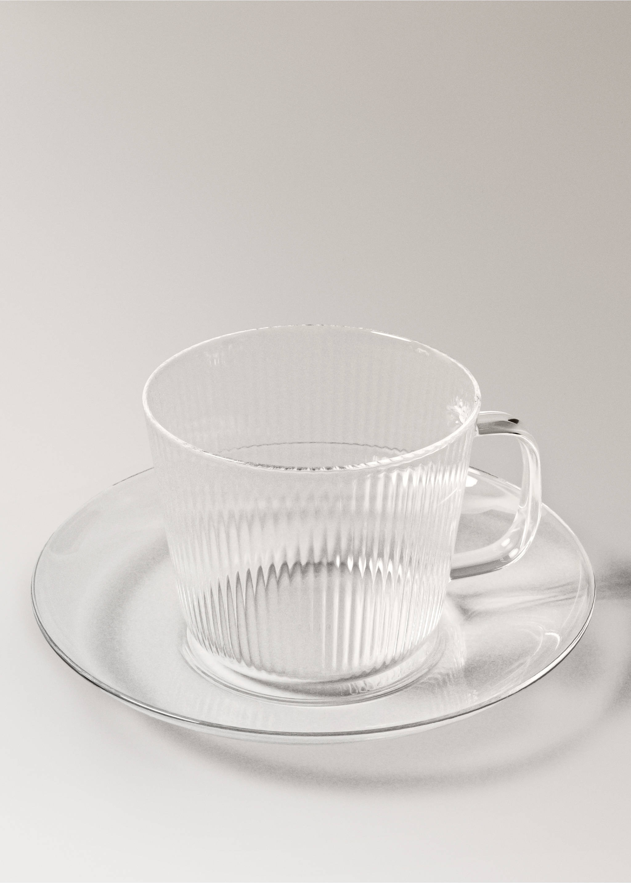 Borosilicate cappuccino cup and saucer with striped pattern - Details of the article 3, Off White. Ref: 17074440-00.