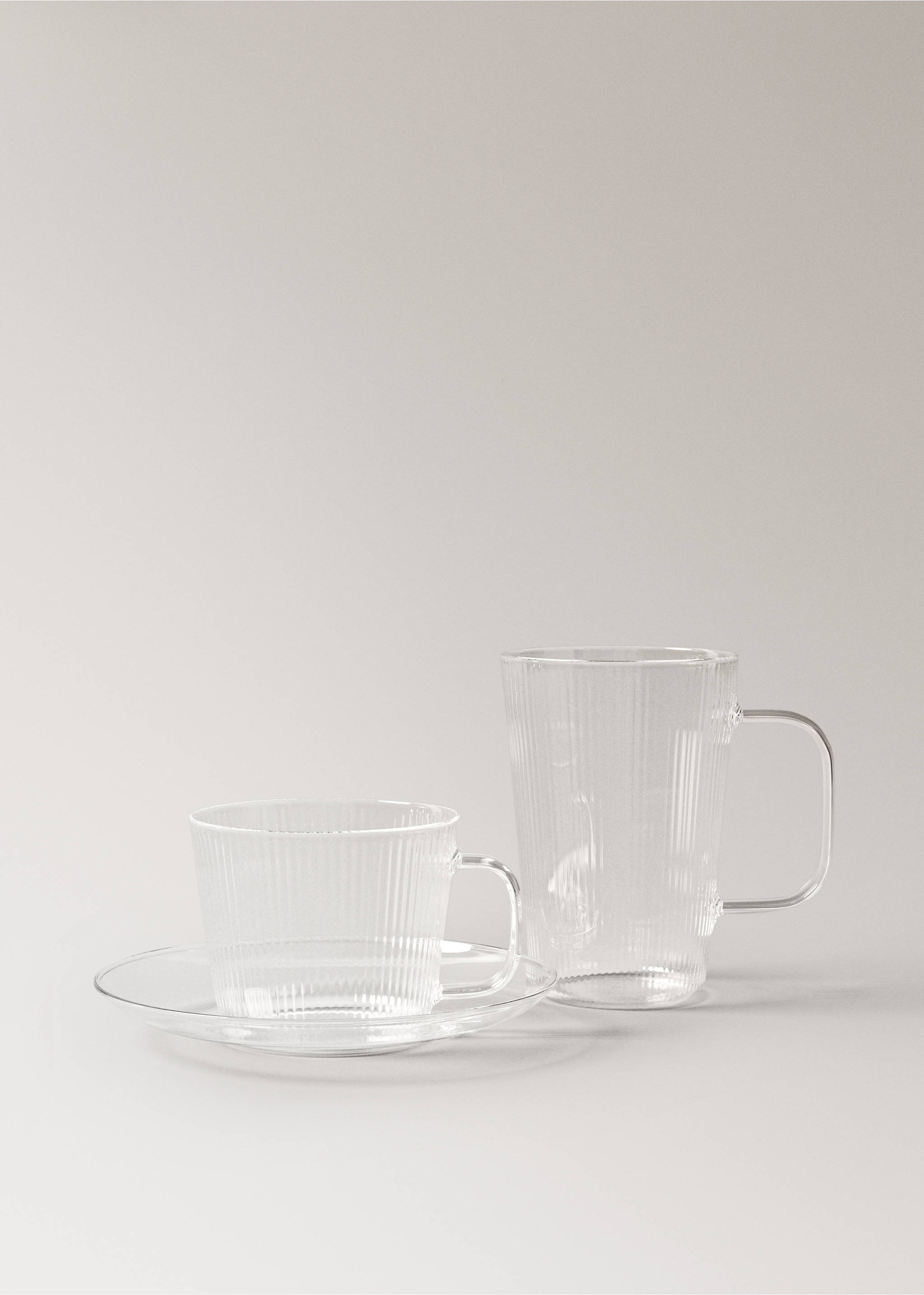 Borosilicate cappuccino cup and saucer with striped pattern - Details of the article 4, Off White. Ref: 17074440-00.
