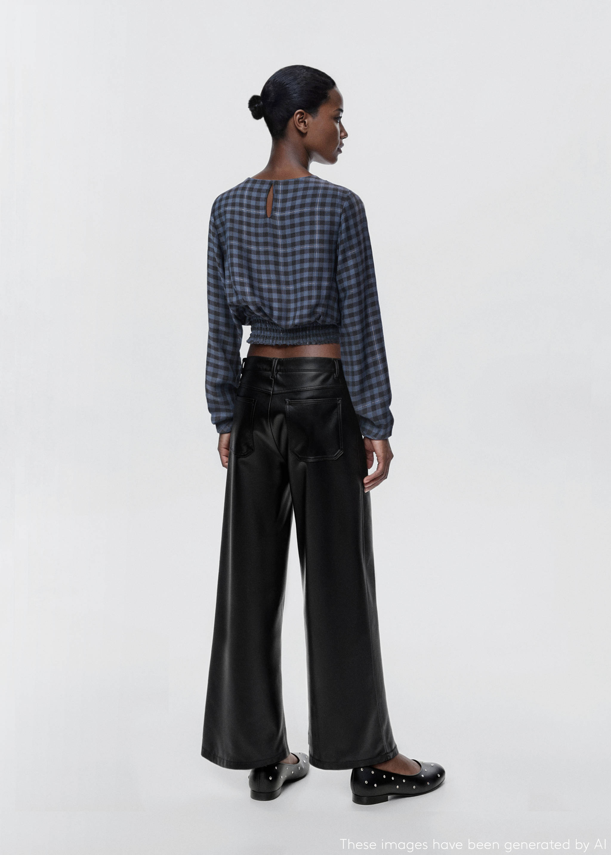 Studded leather-effect trousers - Reverse of the article
