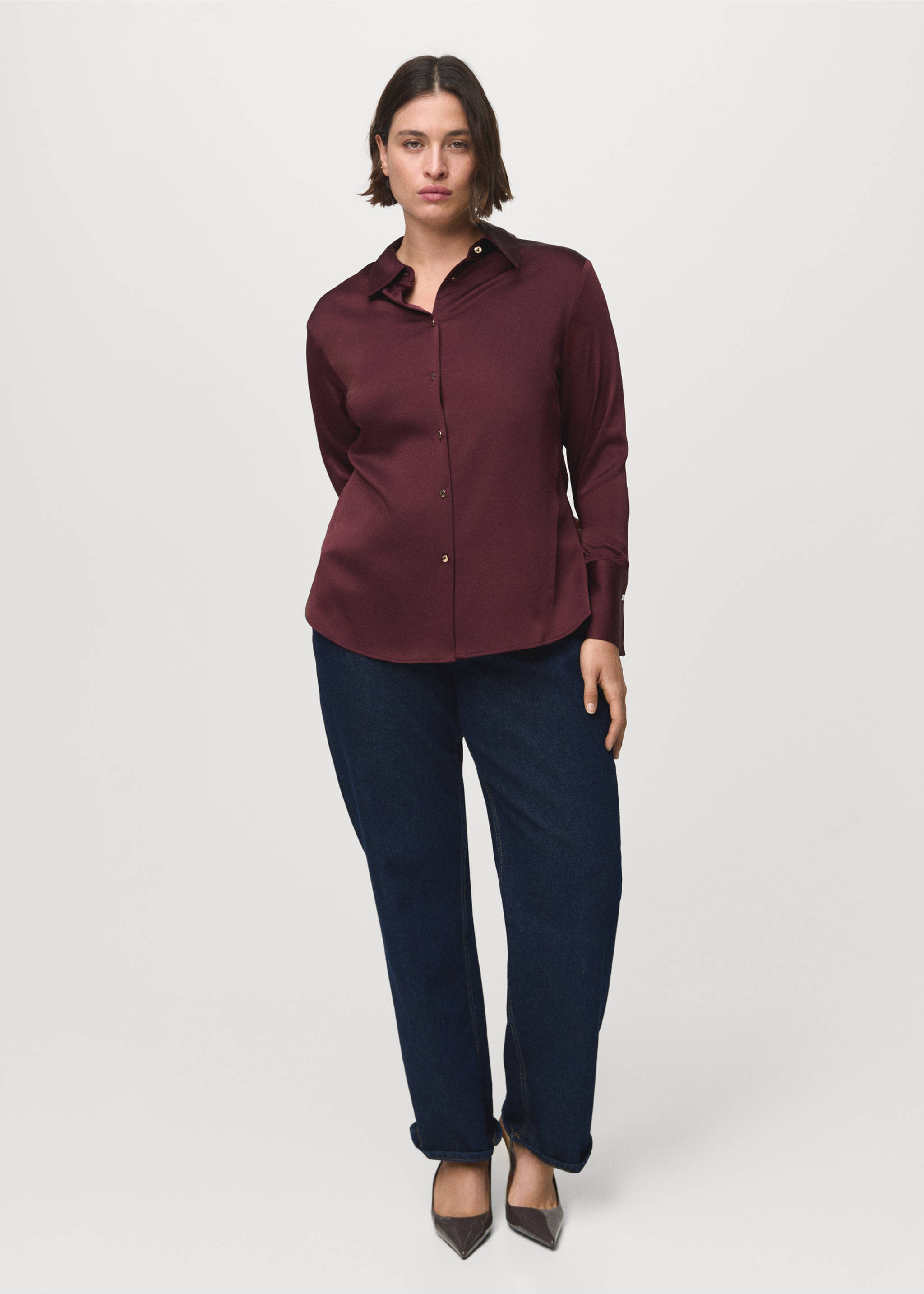 Burgundy long-sleeved shirt with a classic collar and gold-toned buttons, worn with dark blue denim trousers., Burgundy. Ref: 17075801-00.