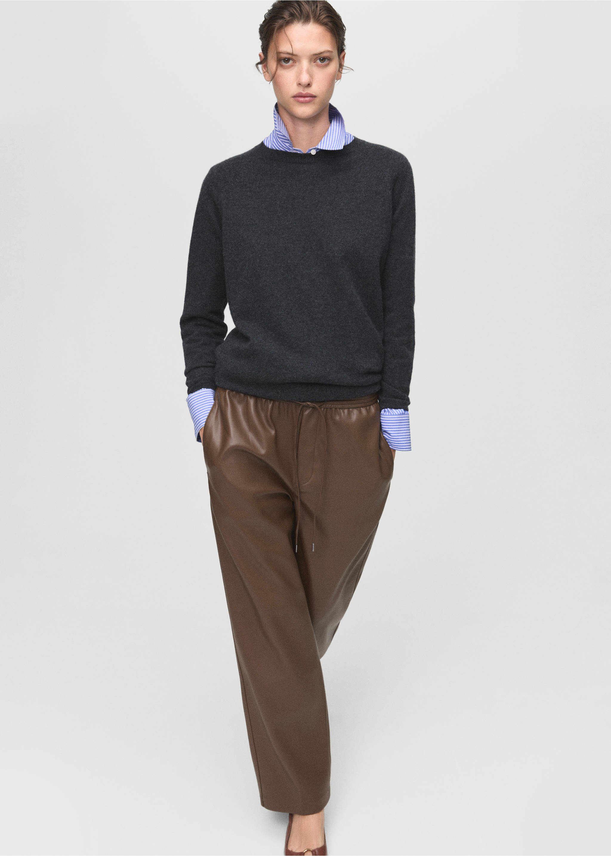 Brown faux-leather trousers with a drawstring waist, styled with a grey jumper and striped shirt., Medium Brown. Ref: 17075974-00.