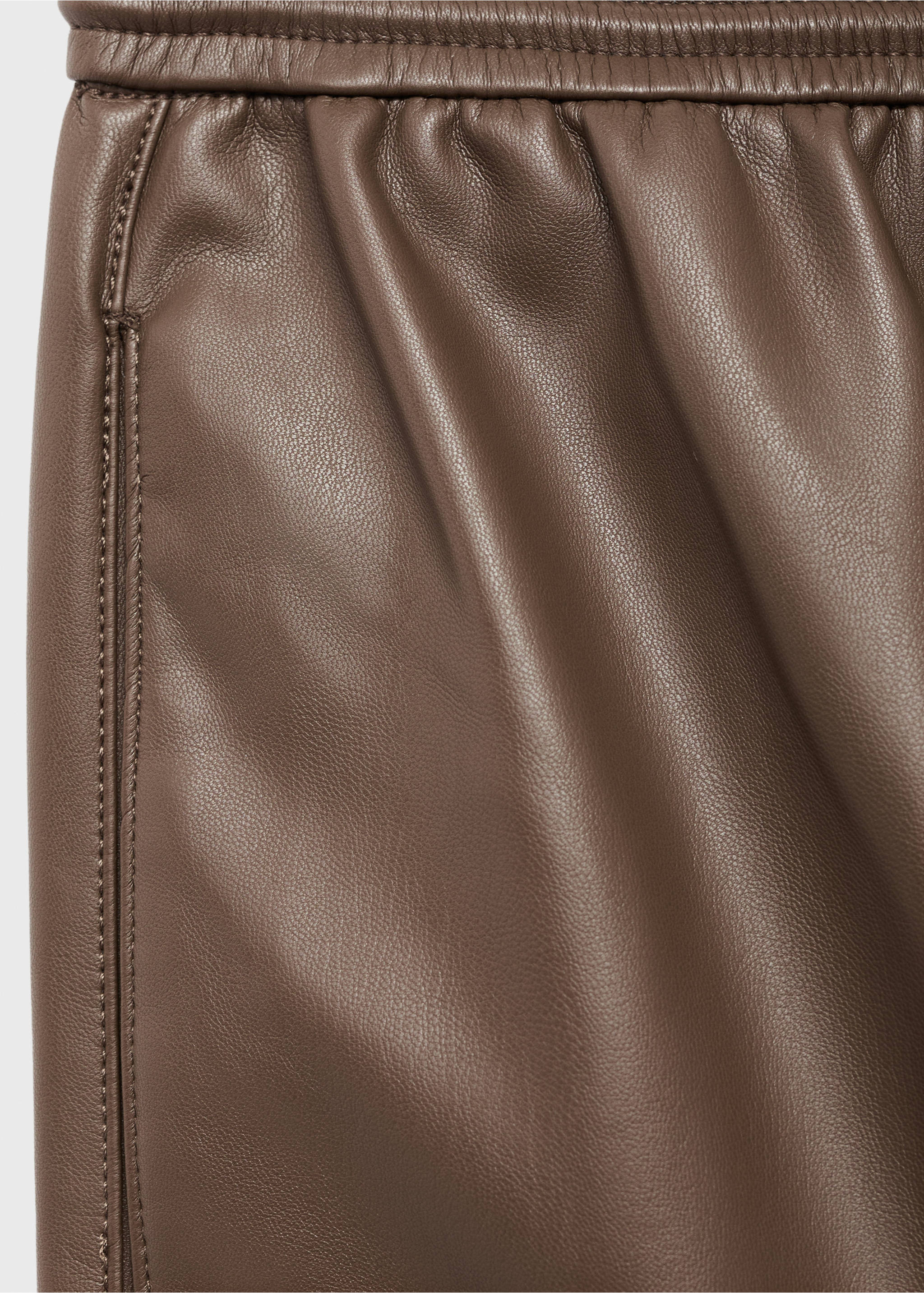 Brown leather trousers fabric detail showing the elasticated waistband., Medium Brown. Ref: 17075974-00.