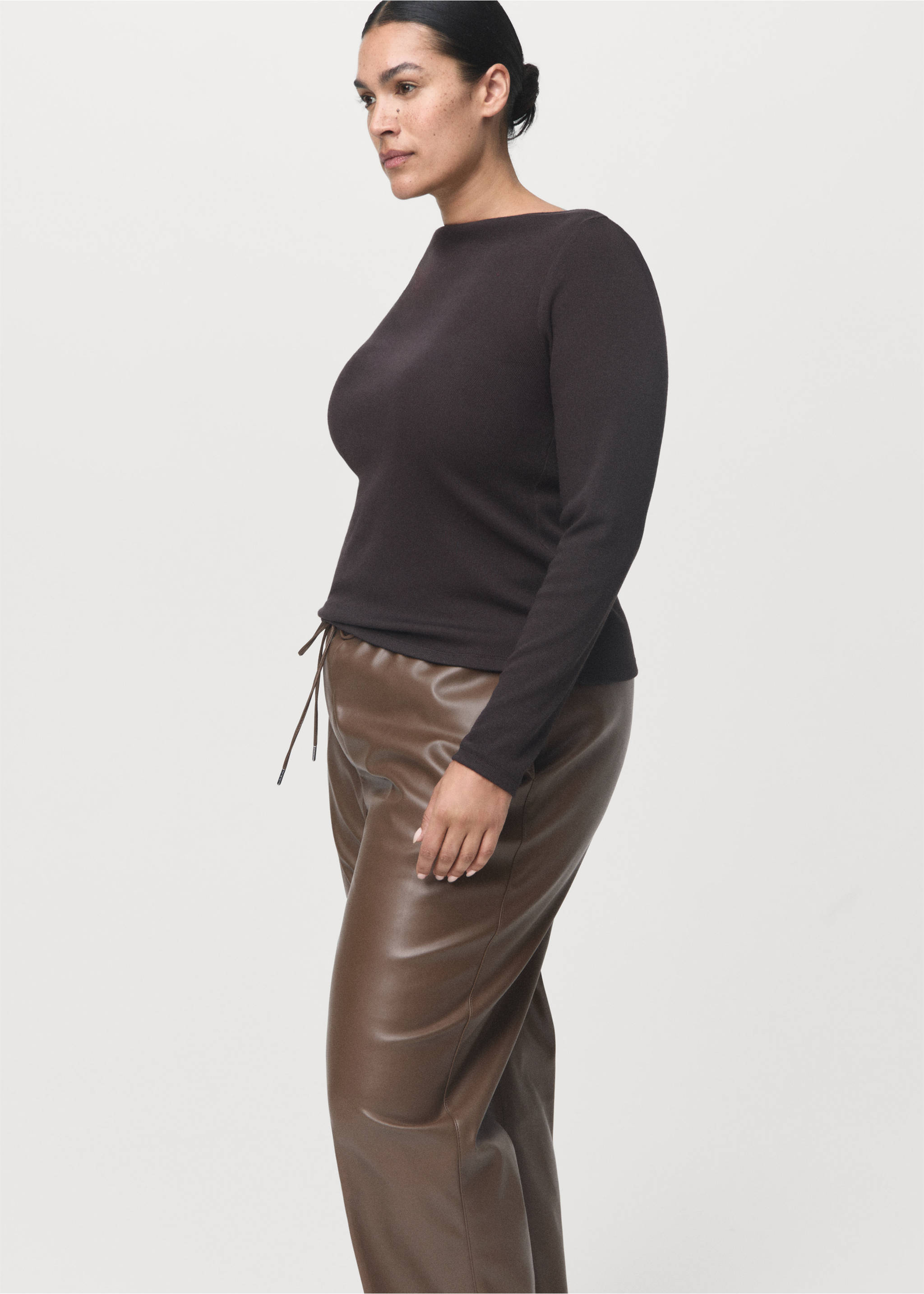 Brown faux-leather trousers with a relaxed fit and a drawstring waist, worn with a dark top., Medium Brown. Ref: 17075974-00.