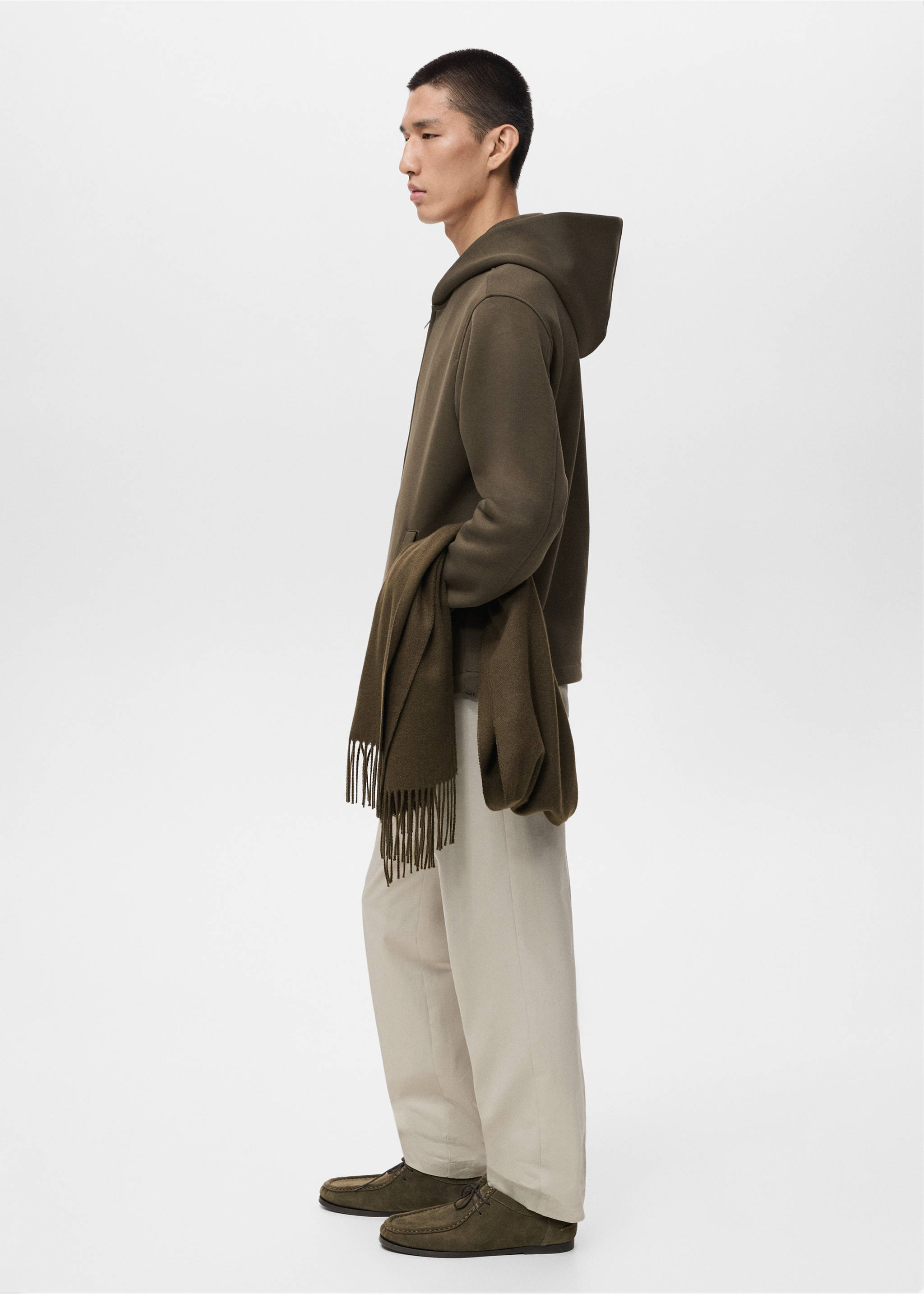 Dark olive green zip-up hoodie with hood, shown in a profile view., Olive Green. Ref: 17075998-00.