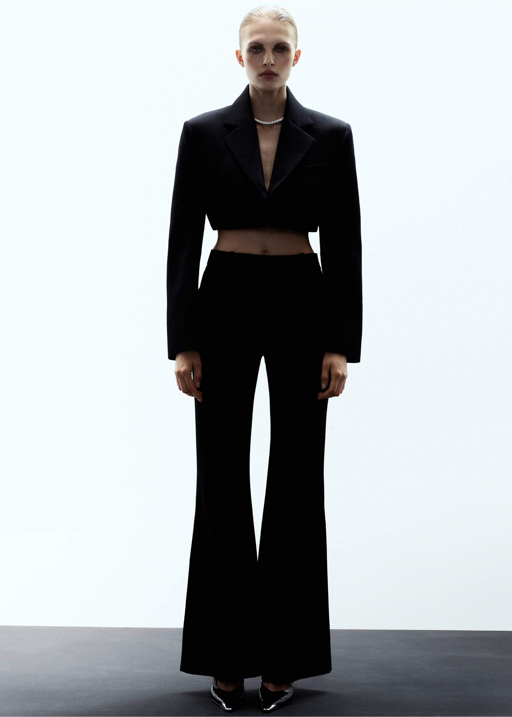 Black cropped blazer with lapels, worn with matching trousers., Black. Ref: 17079120-00.