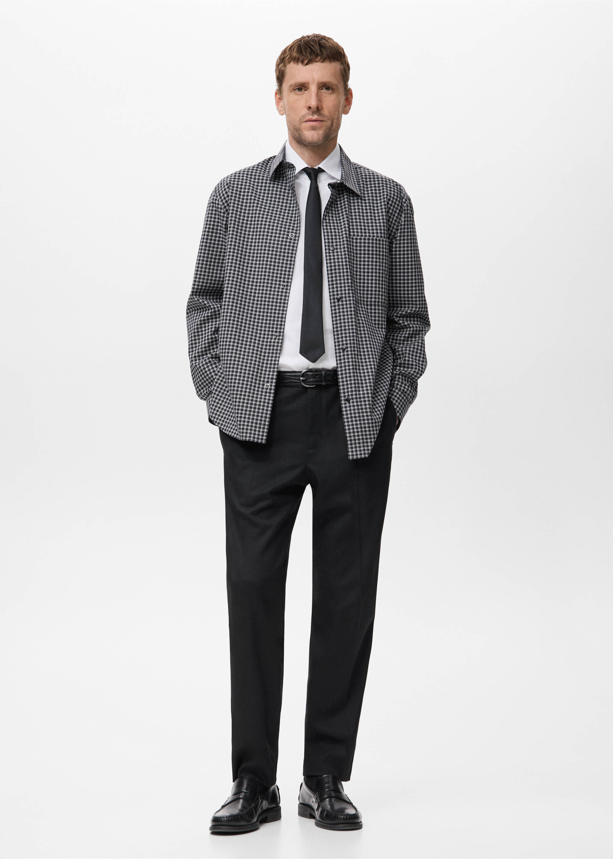 Black and white gingham shirt worn over a white shirt and tie with black trousers., Black. Ref: 17079207-00.