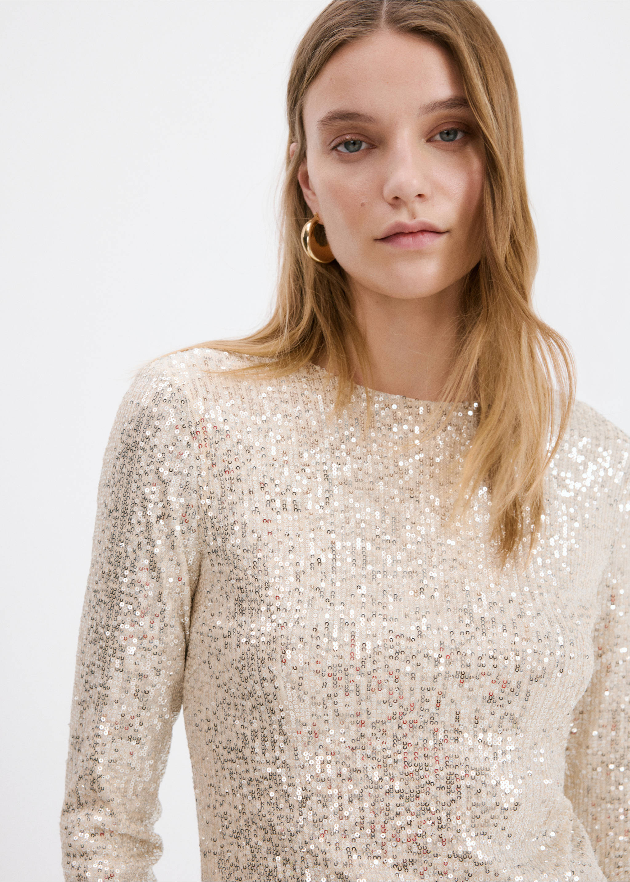 Close-up of a cream sequinned long-sleeve dress with a round neck., Ivory White. Ref: 17079805-00.