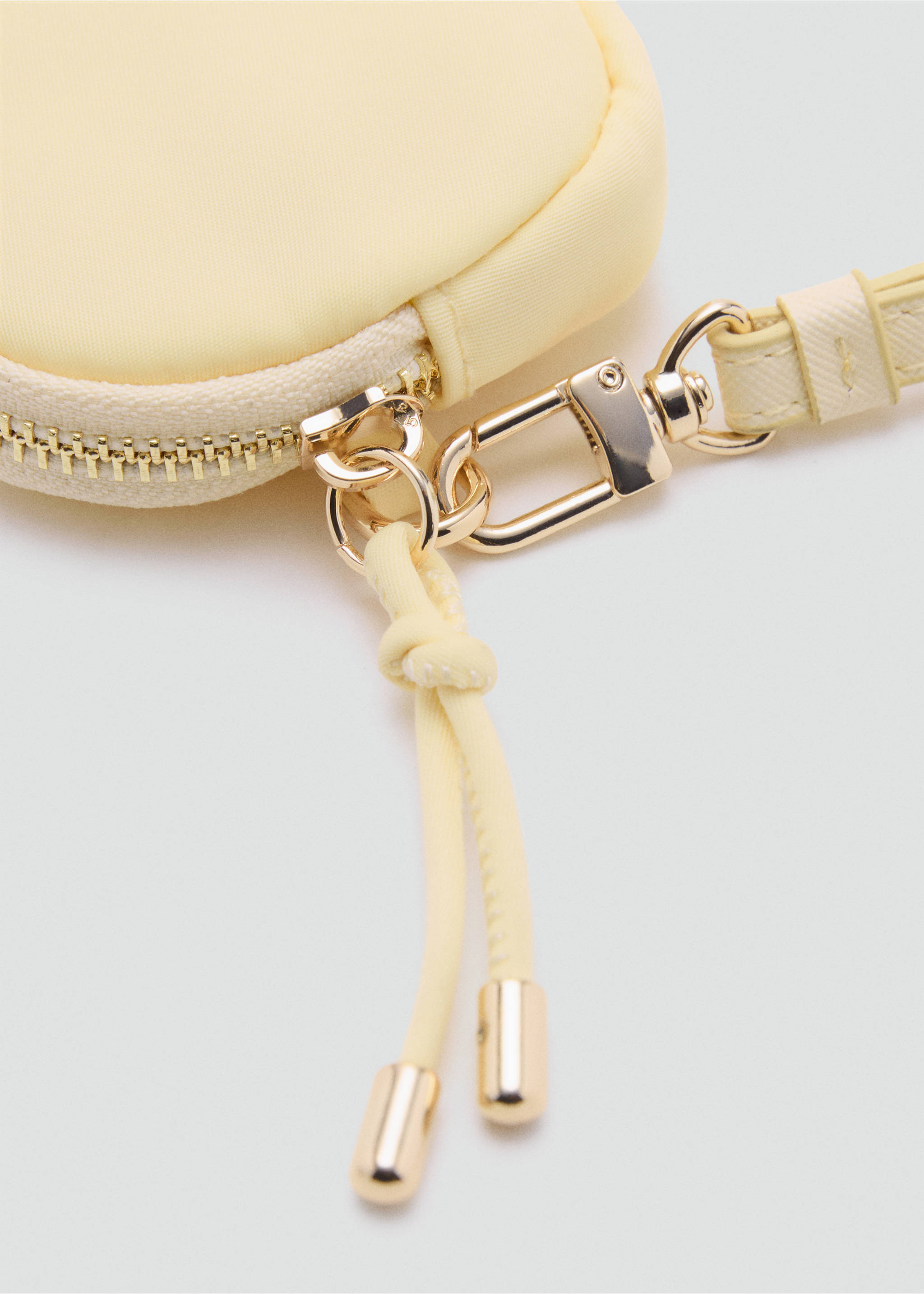 Nylon purse with zip - Details of the article 1, Pastel Yellow. Ref: 17081120-00.