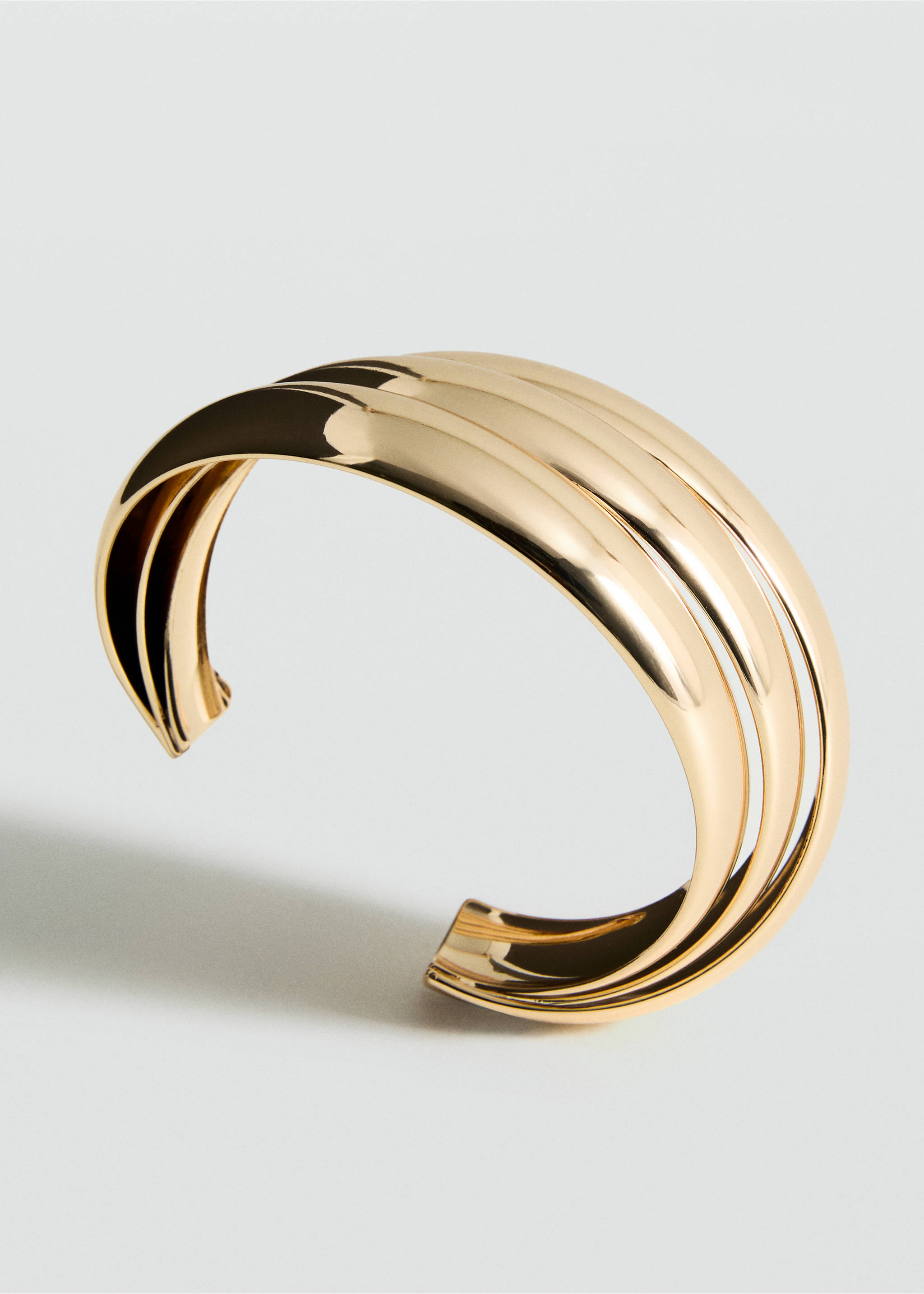 Rigid bracelet with relief - Medium plane, Gold. Ref: 17081192-00.