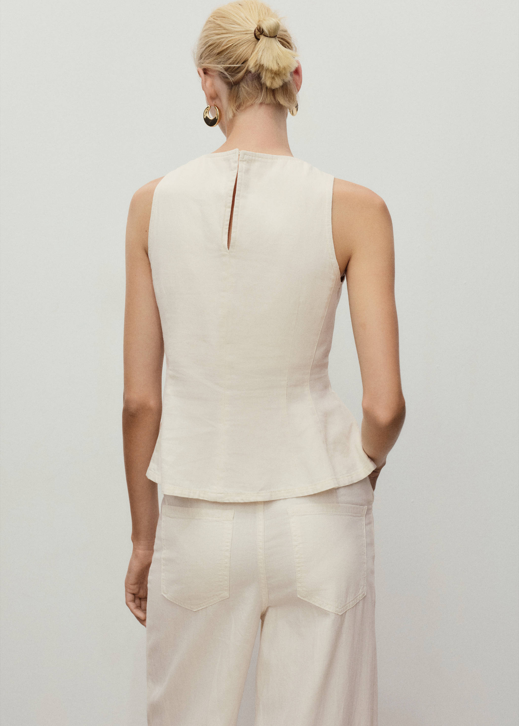 Flared denim top - Reverse of the article