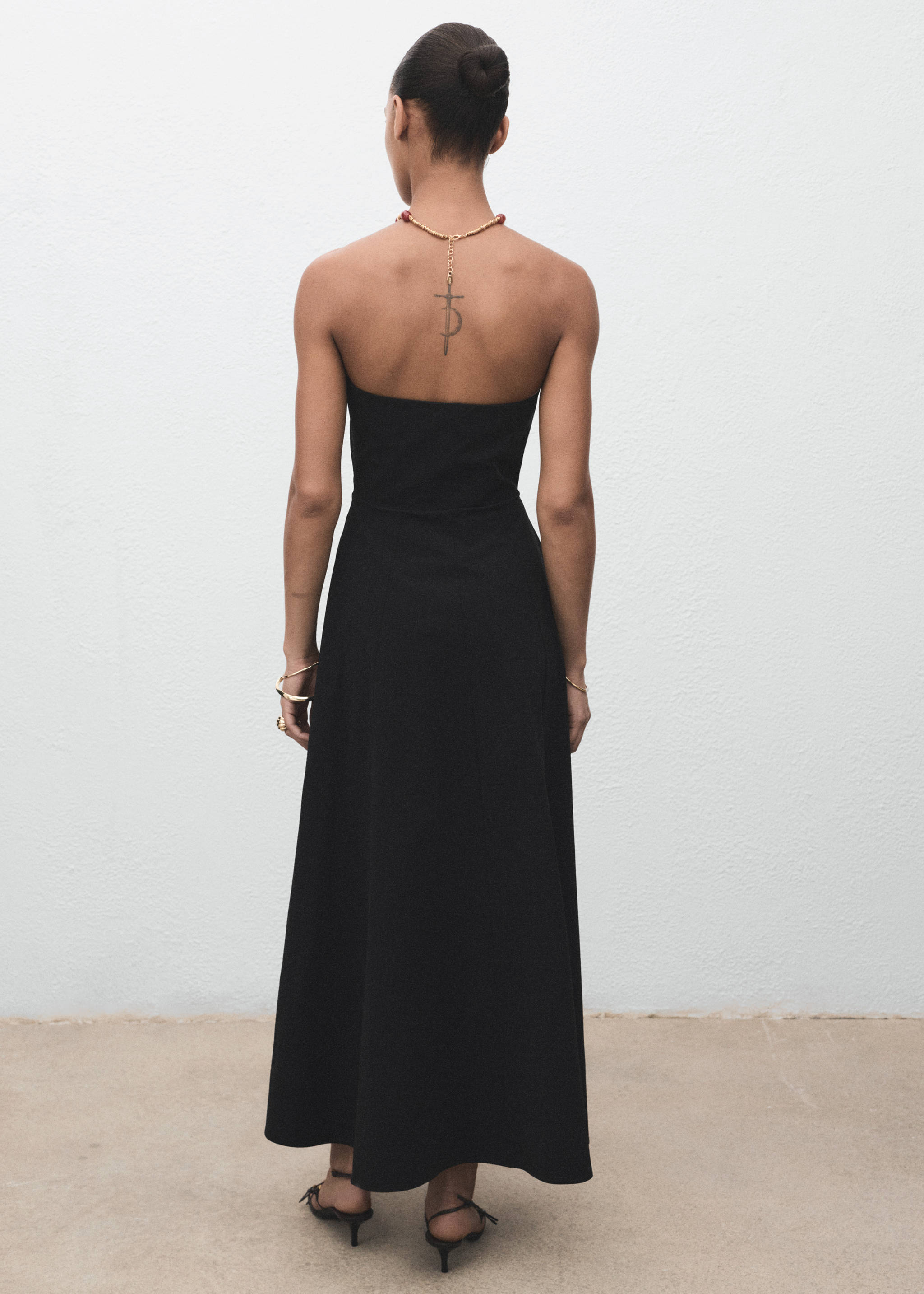 Long strapless dress - Reverse of the article