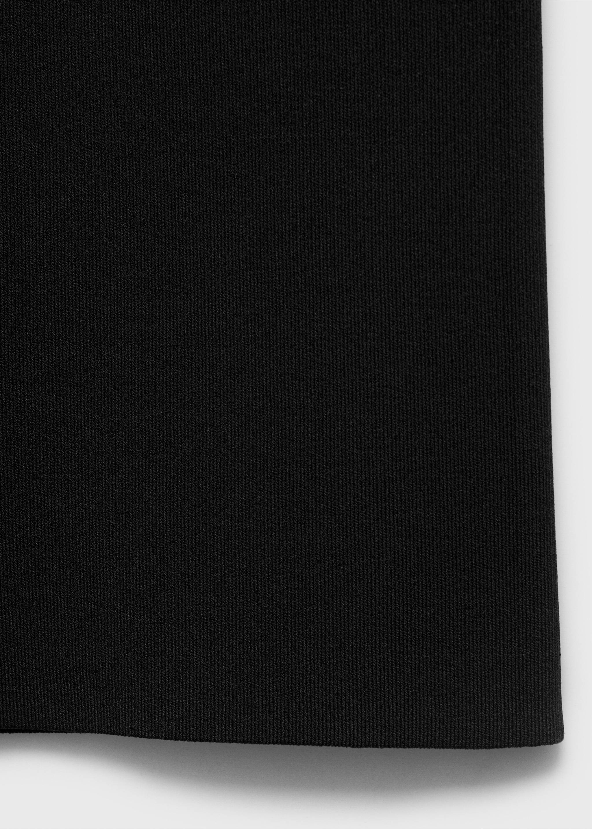 Primer plano de pantalones negros que muestra la textura del tejido de canalé fino., Negro. Ref: 17084116-00.