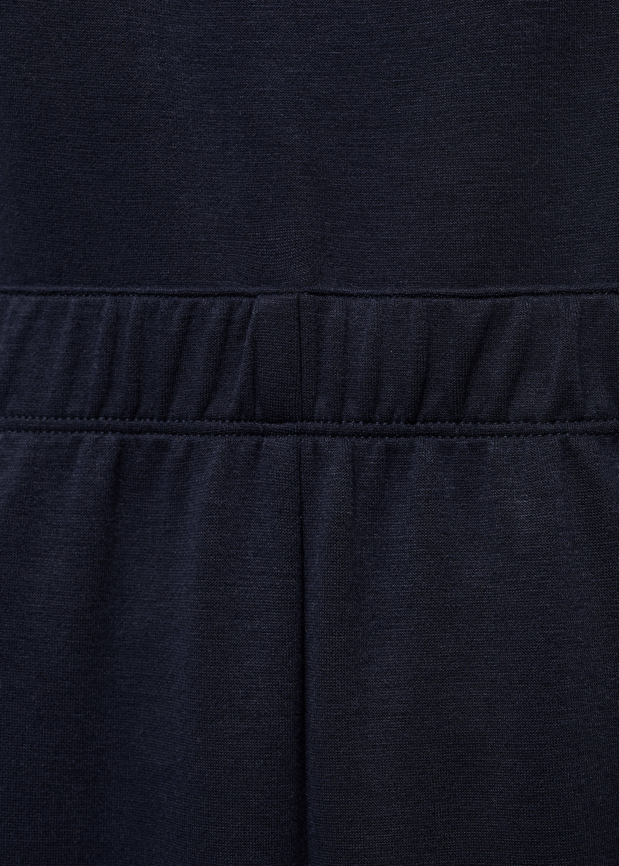Long knitted dungarees - Details of the article 0