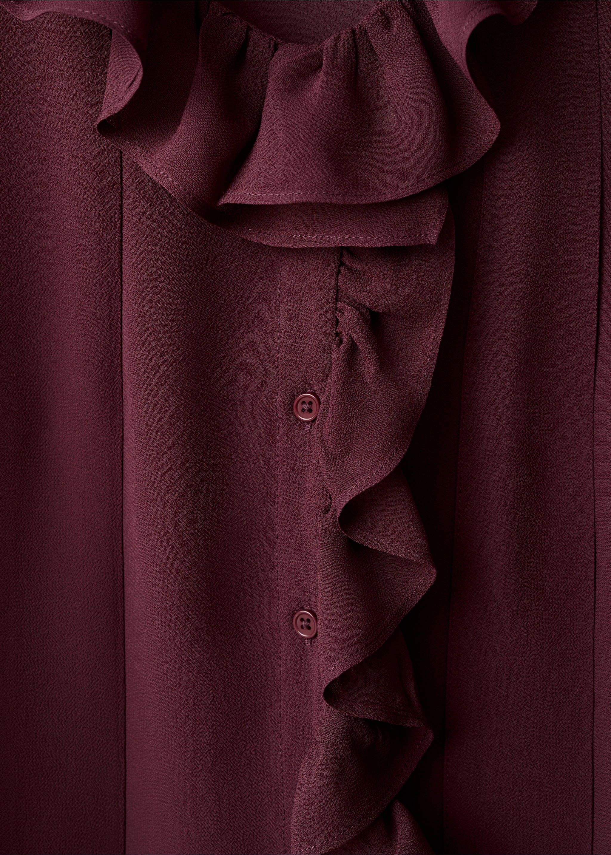 Maroon blouse detail featuring a ruffled collar and vertical ruffle placket., Burgundy. Ref: 17085826-00.