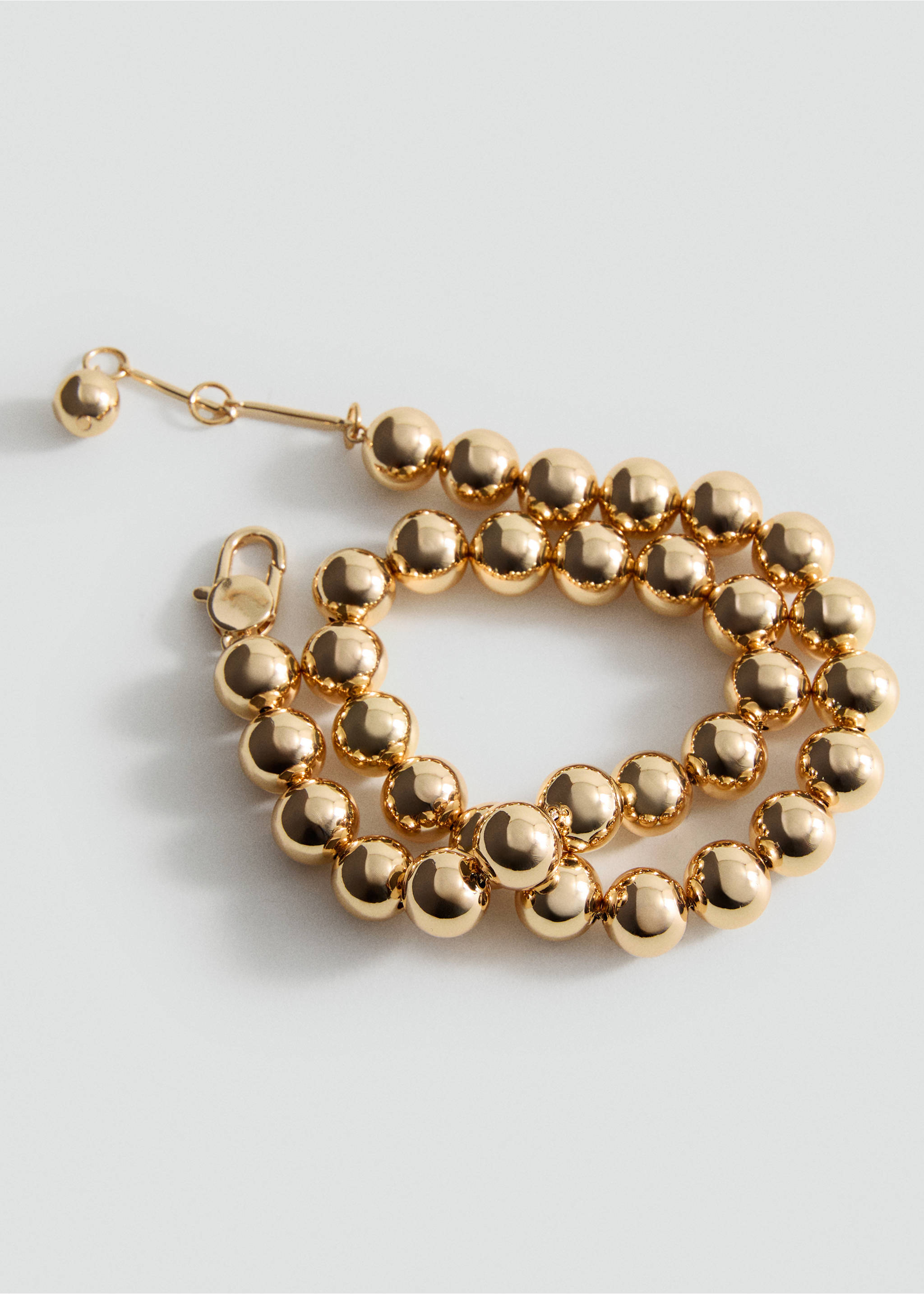 Metallic spheres necklace - Details of the article 2, Gold. Ref: 17086359-00.