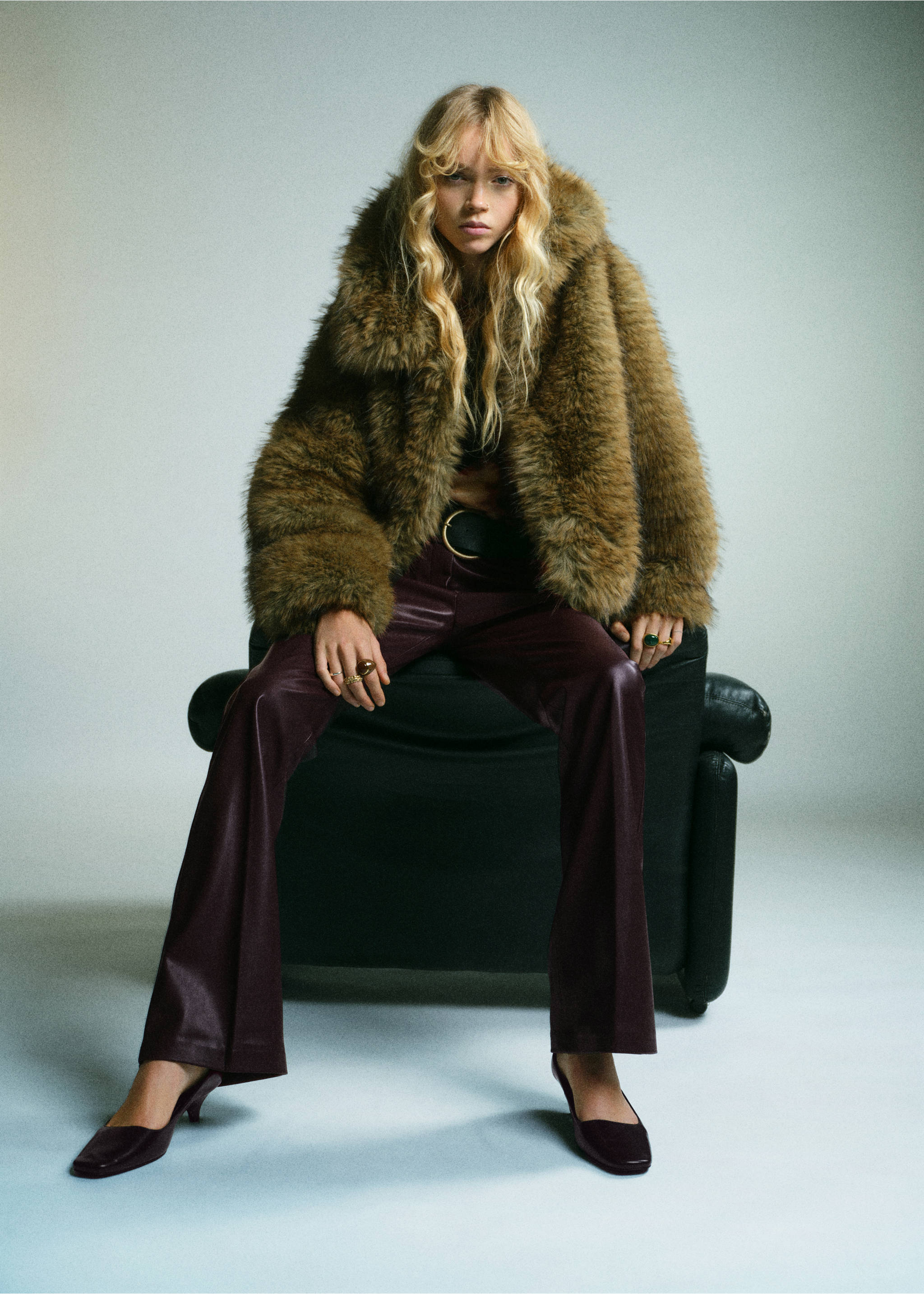 Dark purple court shoes with low heels, worn with leather-effect trousers., Chocolate. Ref: 17087775-00.