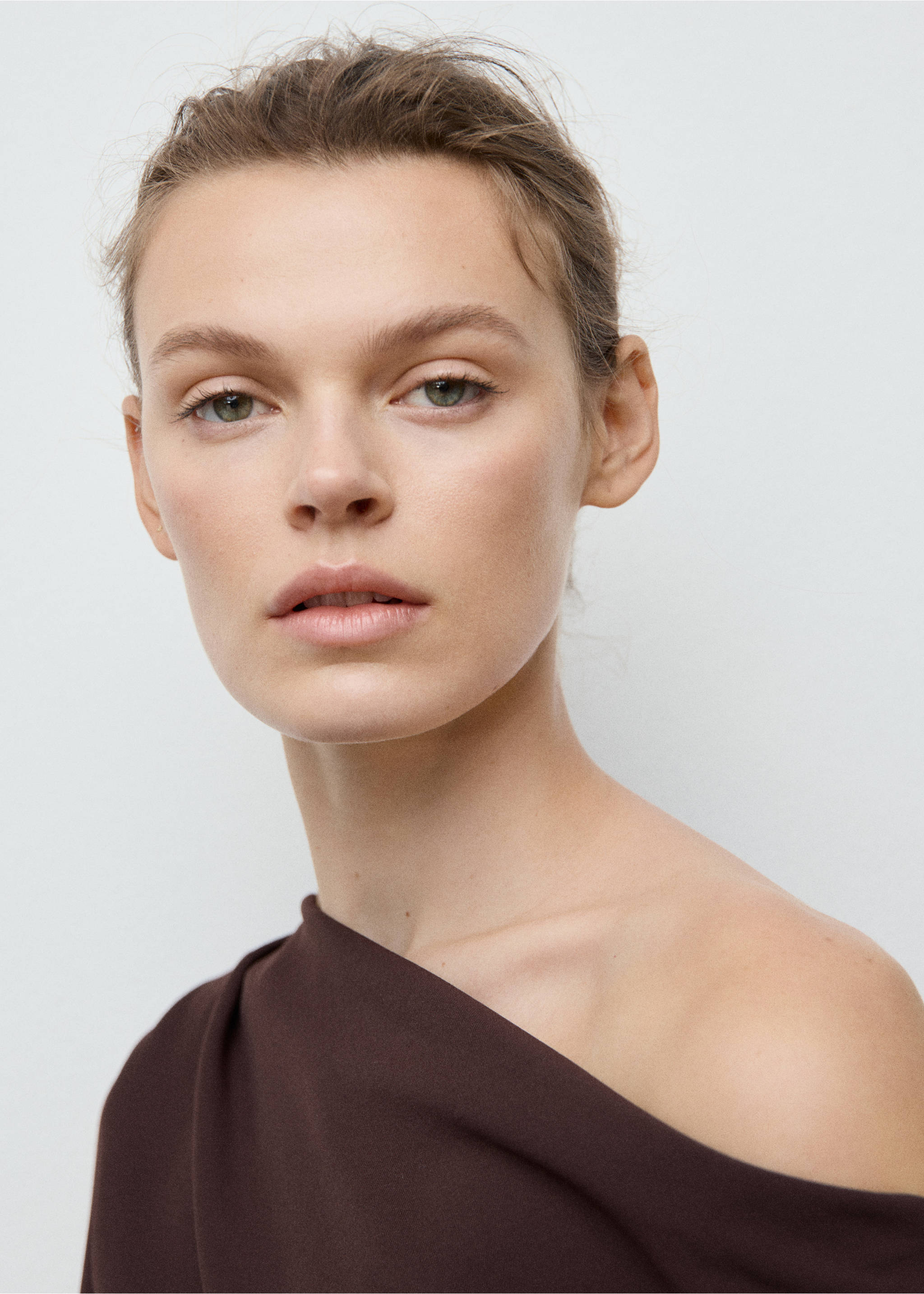 Close-up of a dark brown off-the-shoulder blouse with draped pleats., Brown. Ref: 17087791-00.