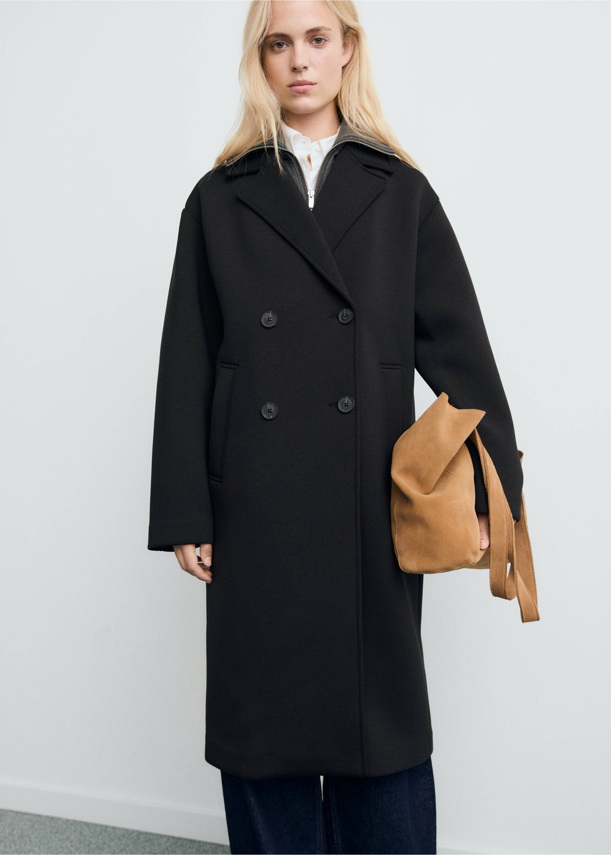 Black double-breasted coat with notched lapels and front buttons., Black. Ref: 17087801-00.