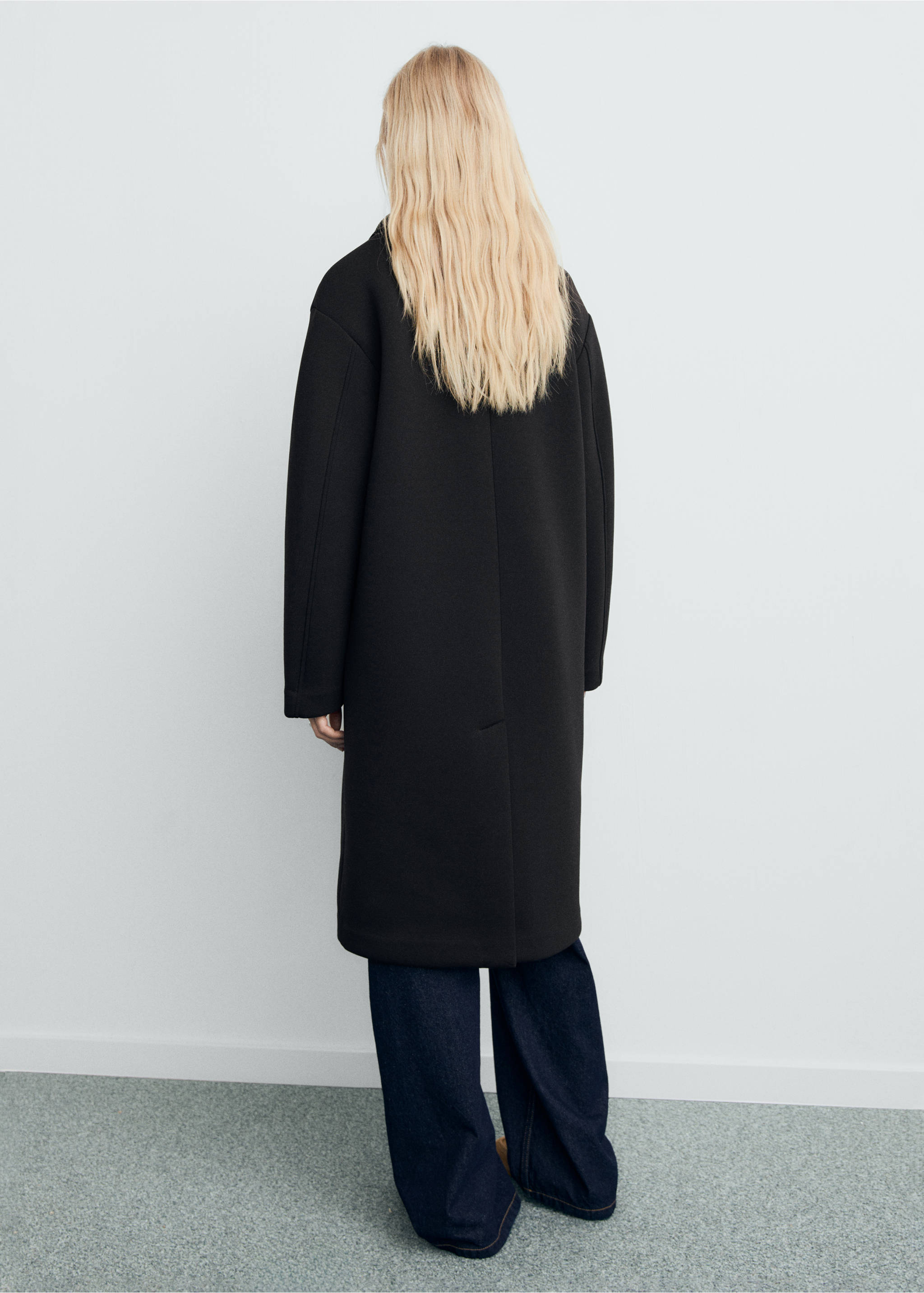 Back view of a black long coat with a relaxed fit., Black. Ref: 17087801-00.