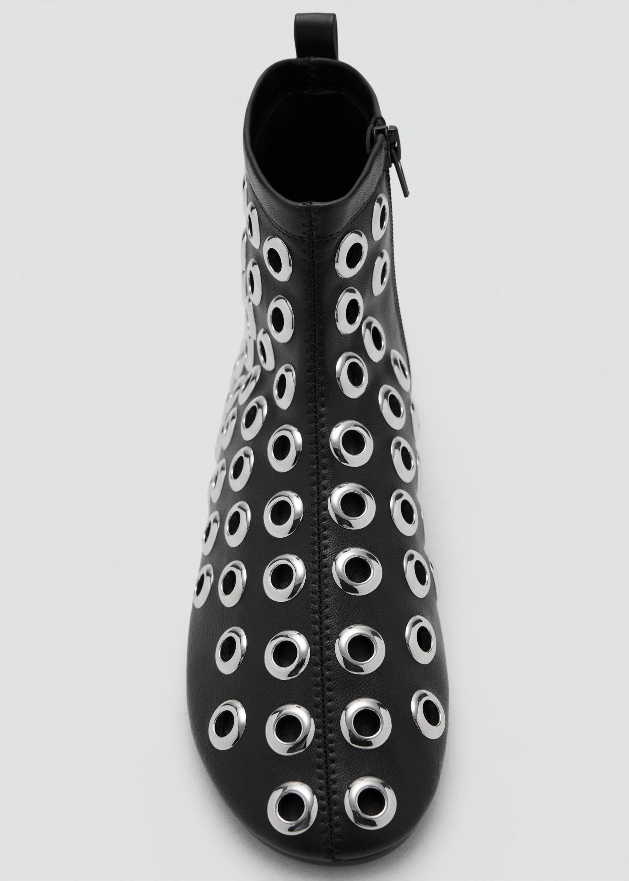 Black ankle boot embellished with silver-toned metal eyelets., Black. Ref: 17088633-00.