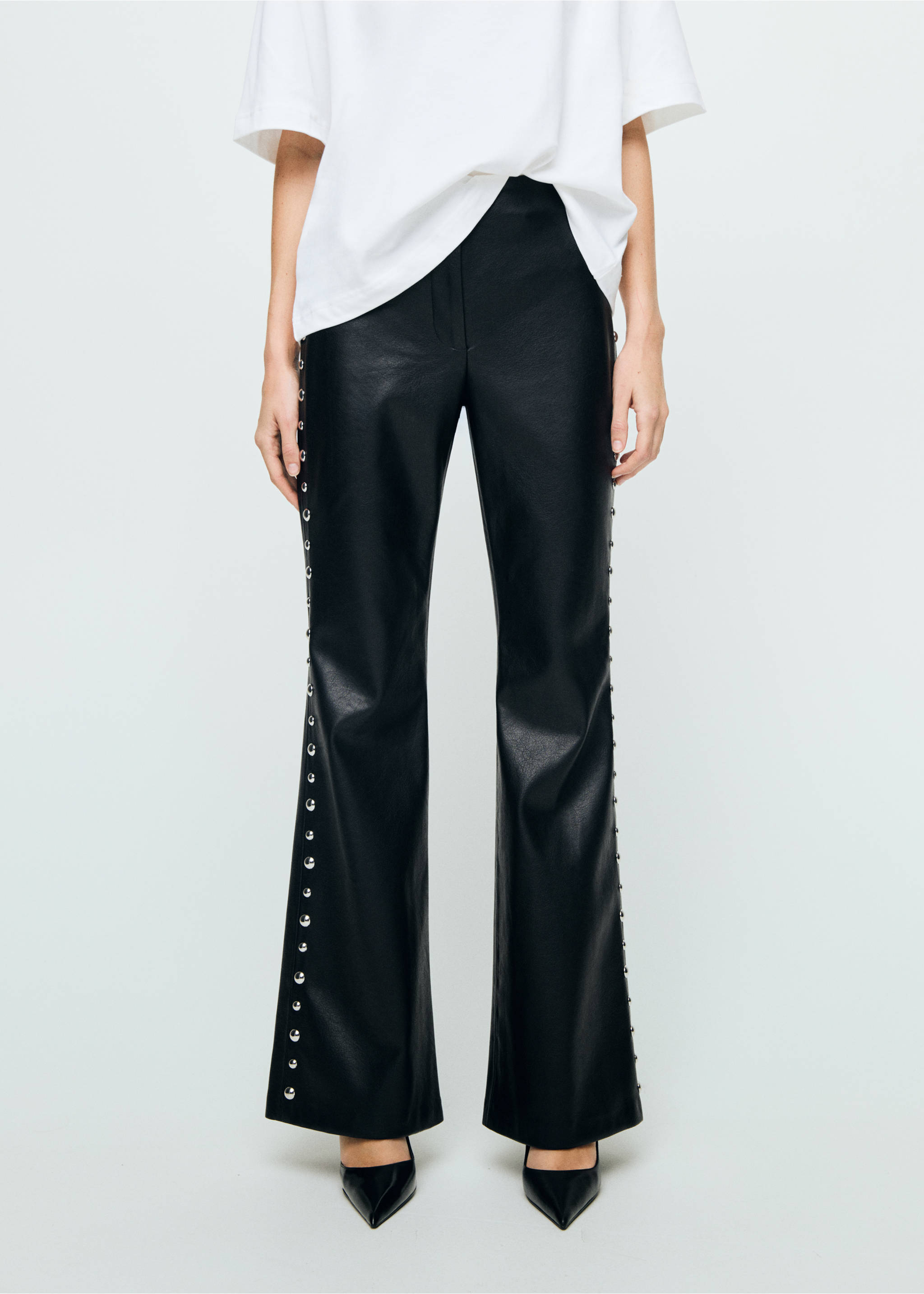 Studded faux-leather trousers - Medium plane, Black. Ref: 17089109-00.