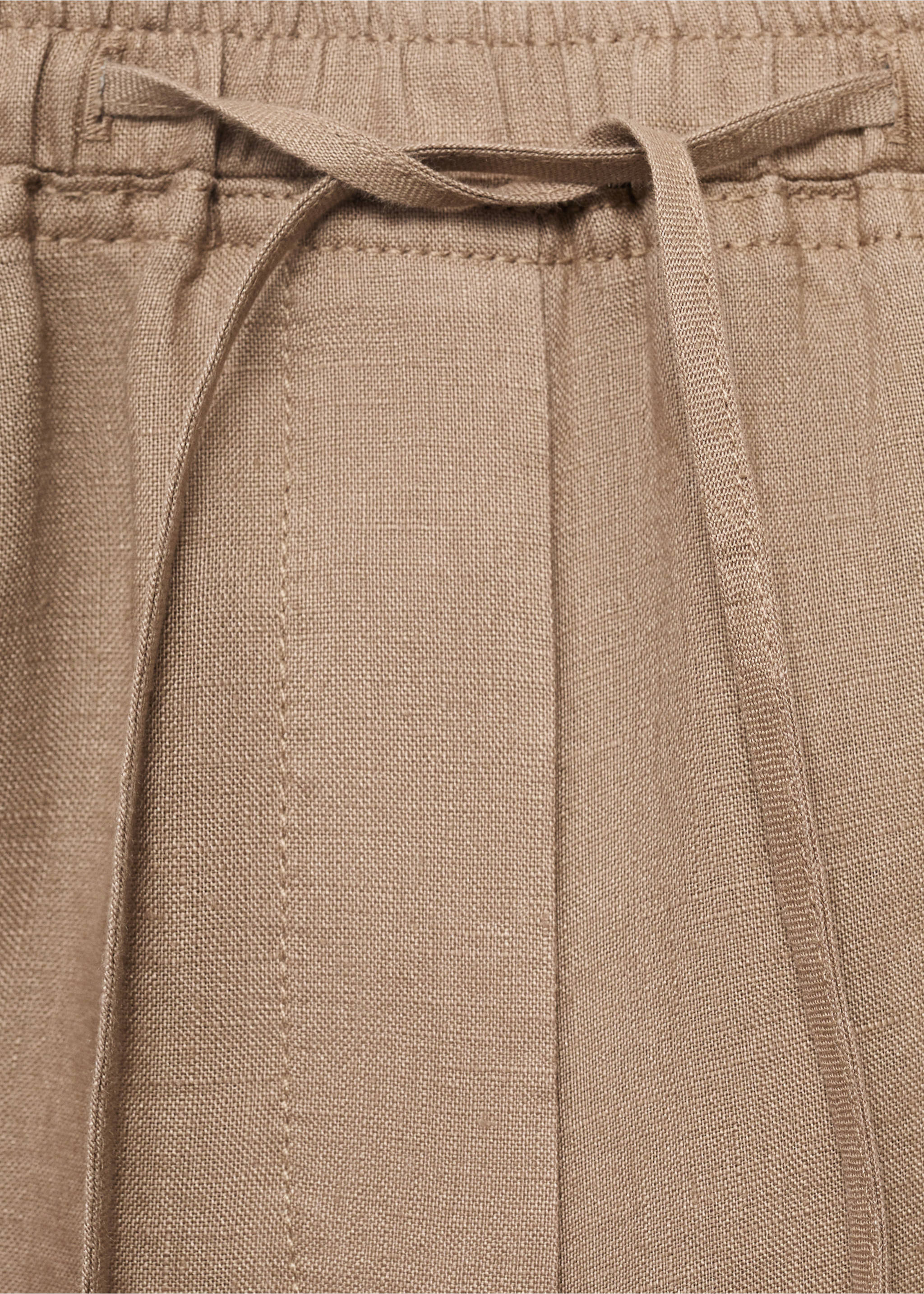 Linen trousers with drawstring - Details of the article 8, Medium Brown. Ref: 17091162-00.