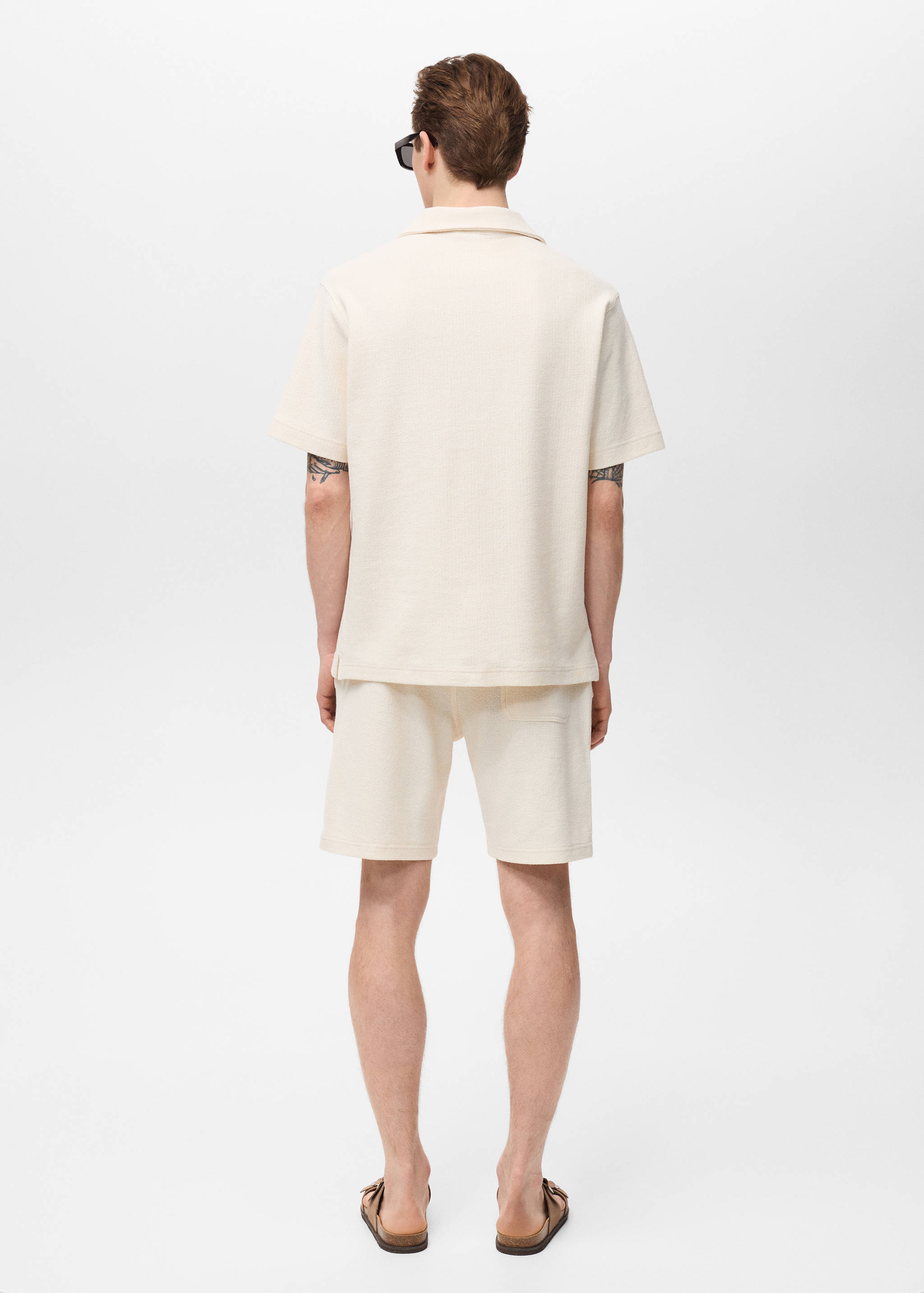 Koszulka polo regular fit z teksturą - Tylna strona artykułu