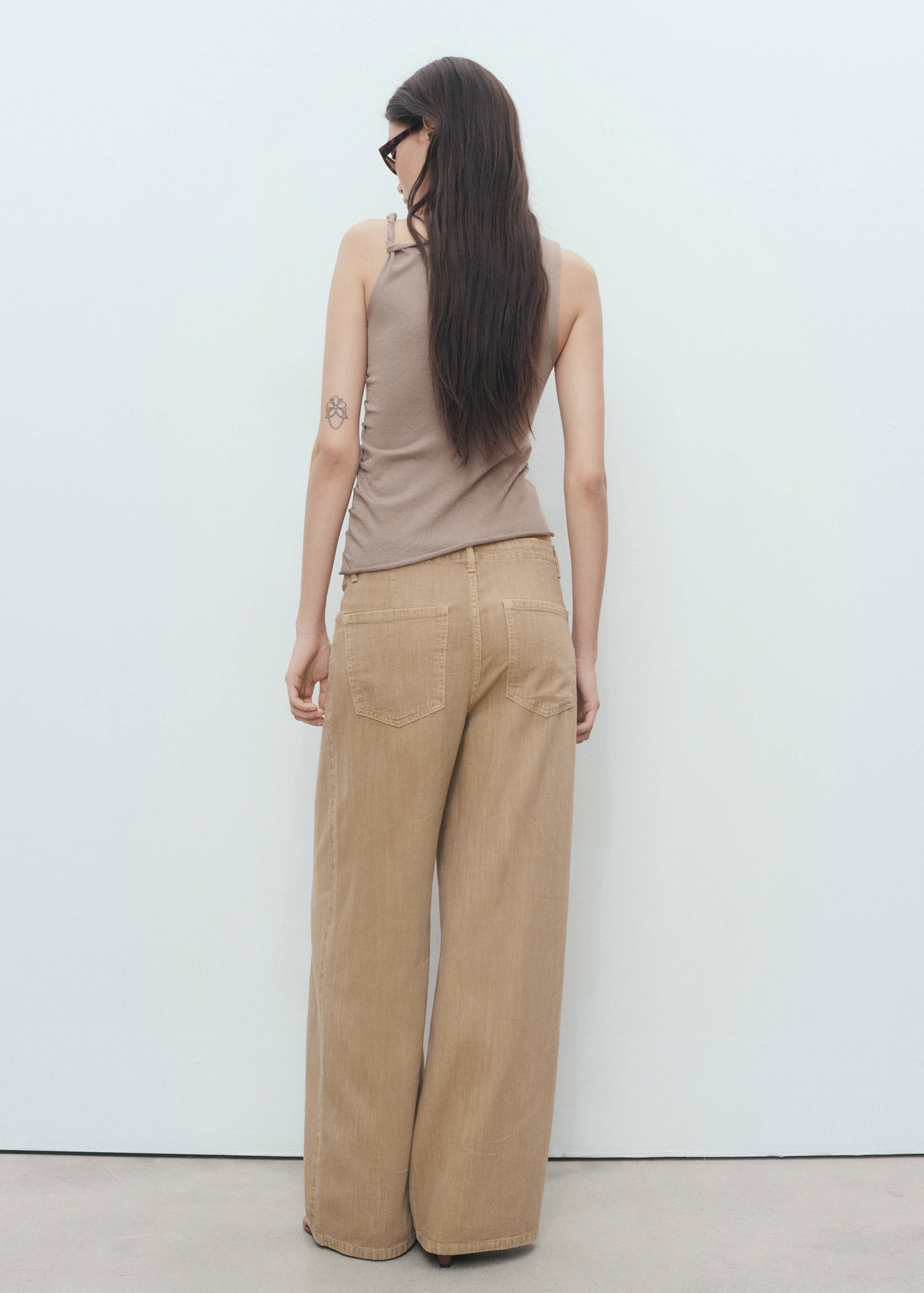 Asymmetrisches Stricktop mit Trägern - Rückseite des Artikels