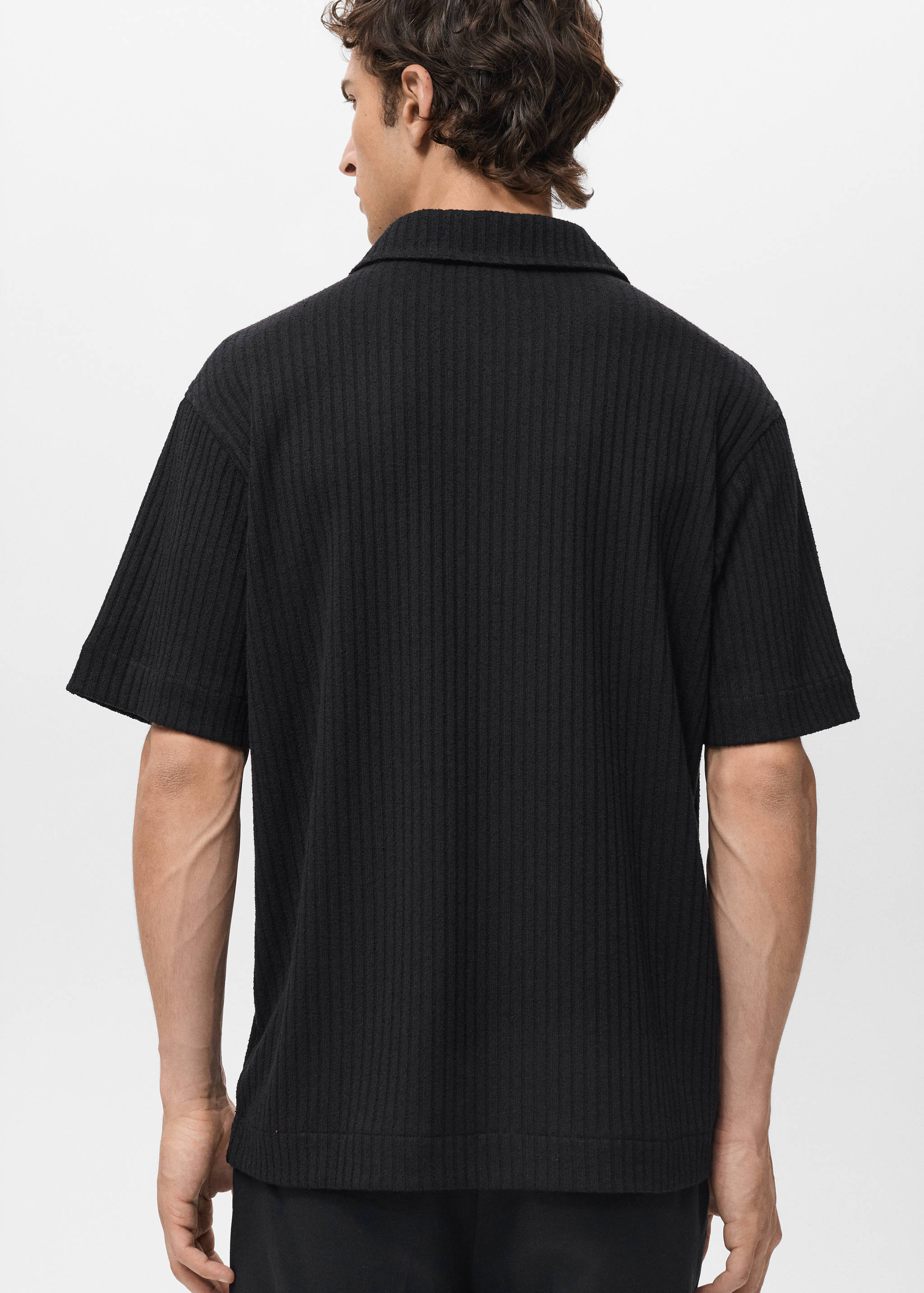 Textured knitted polo shirt - Reverse of the article