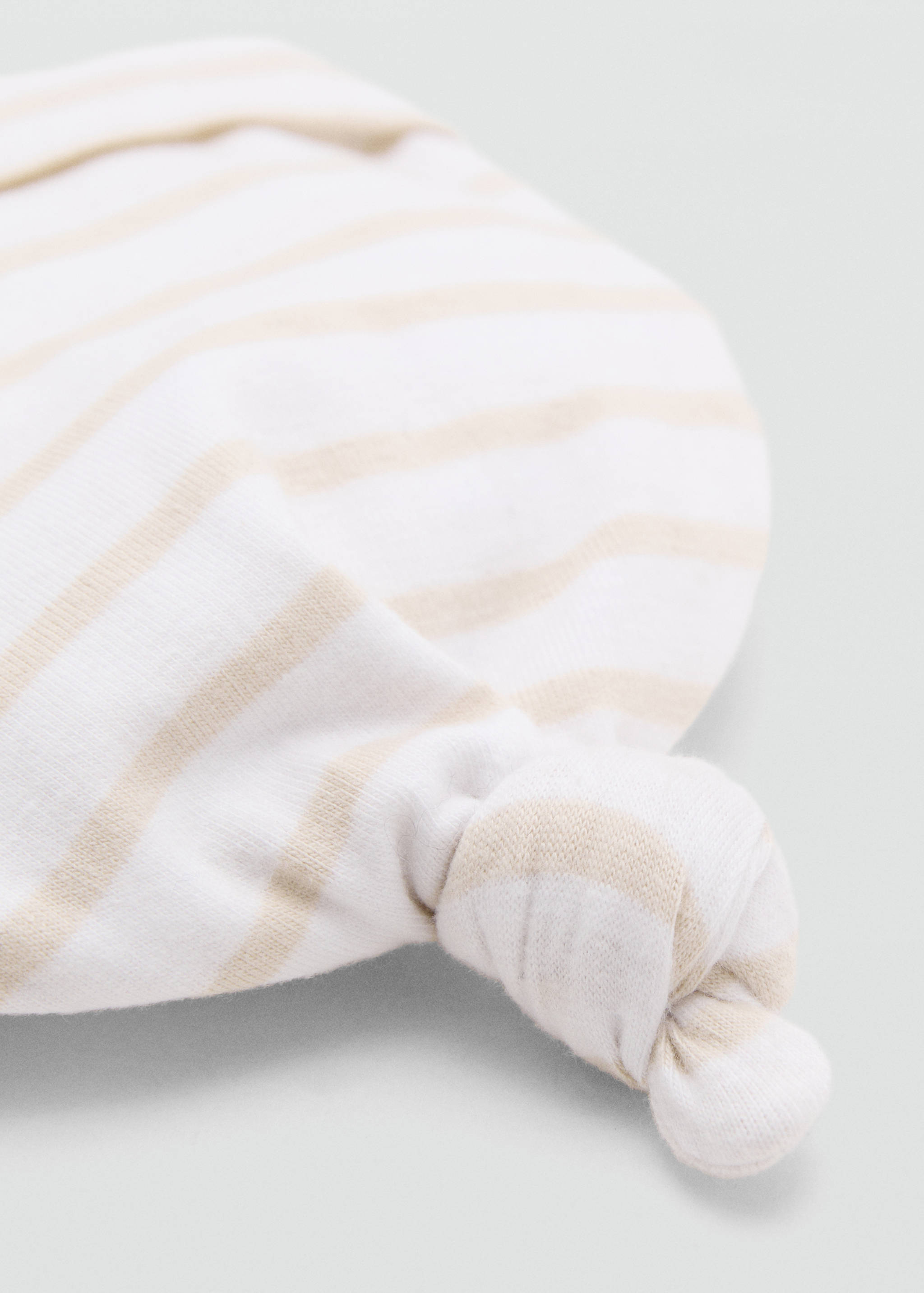 Gorra detall nus - Detall de l'article 1