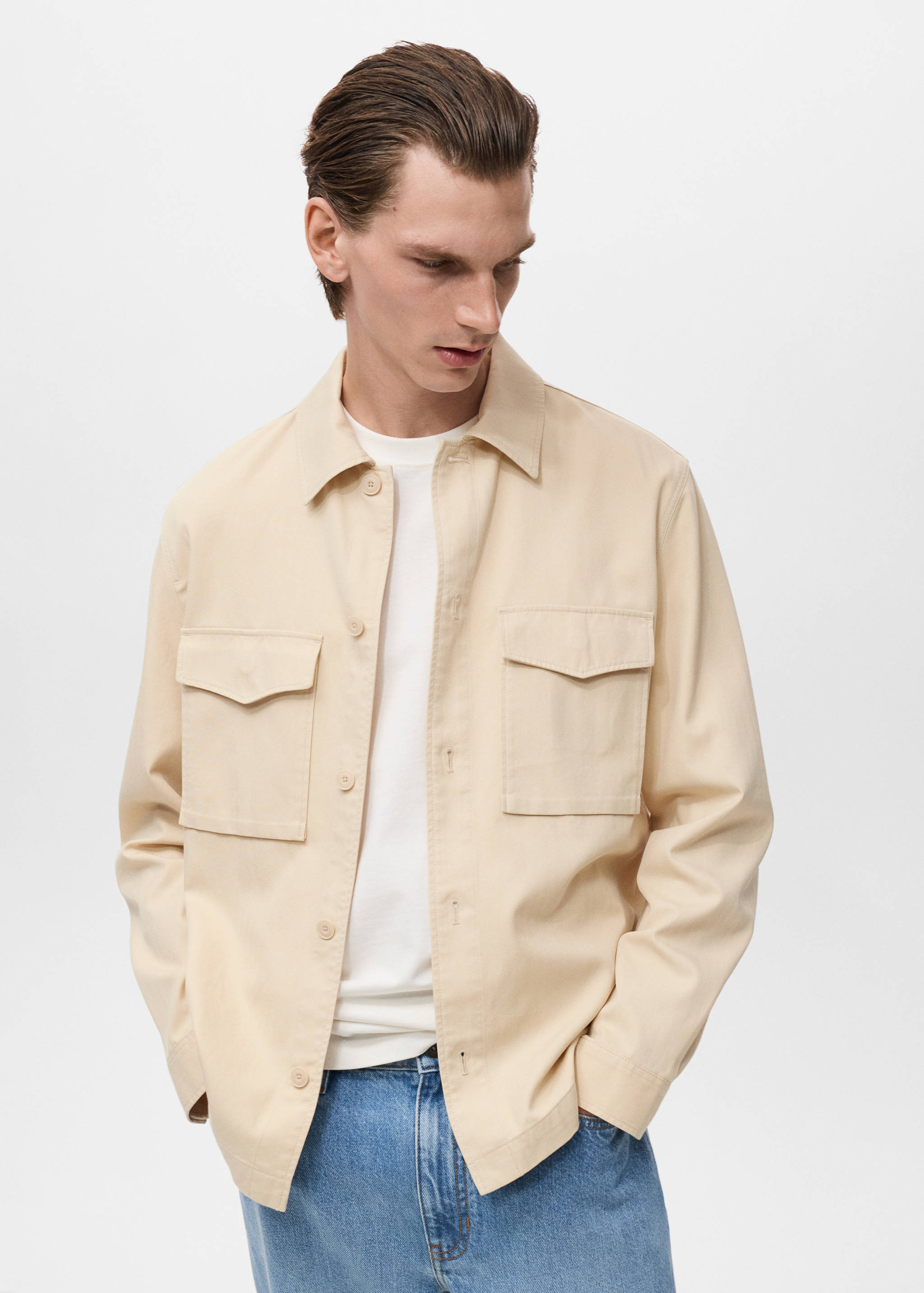 Bunda z bavlny a lyocellu s kapsami - Náhled ve středové rovině