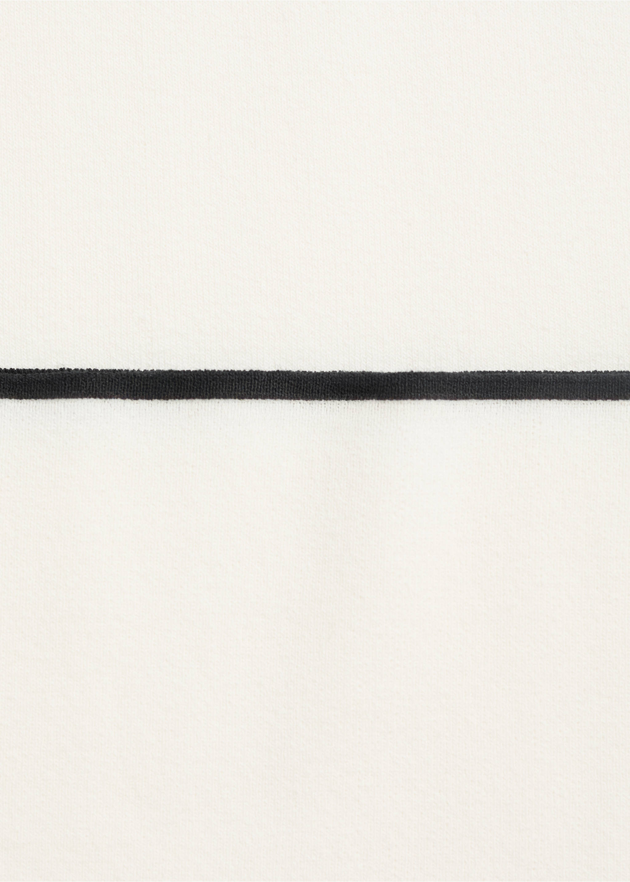 Contrasting low-rise knitted trousers - Details of the article 8, Ecru. Ref: 17094775-00.