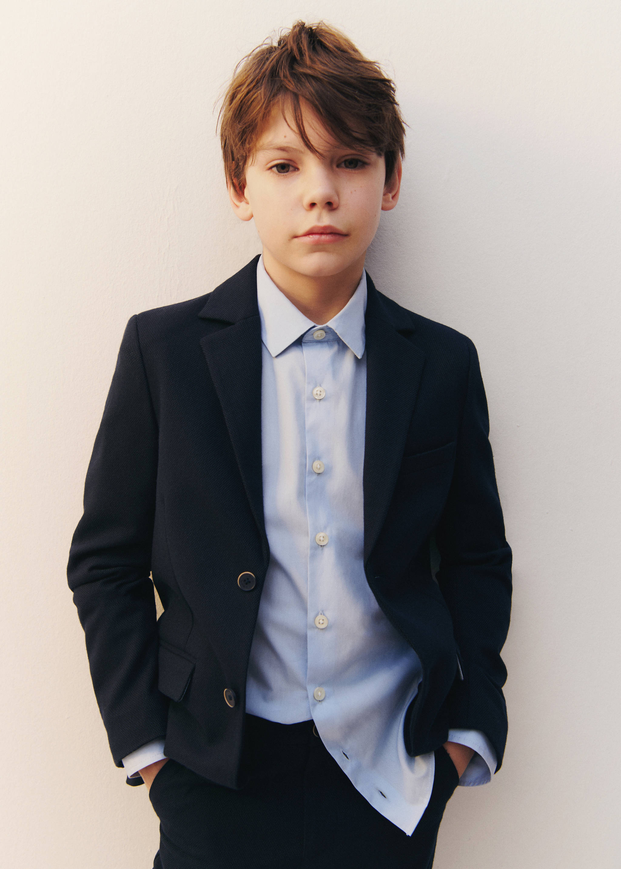 Light blue button-up shirt worn under a navy blue blazer., Sky Blue. Ref: 17095795-00.