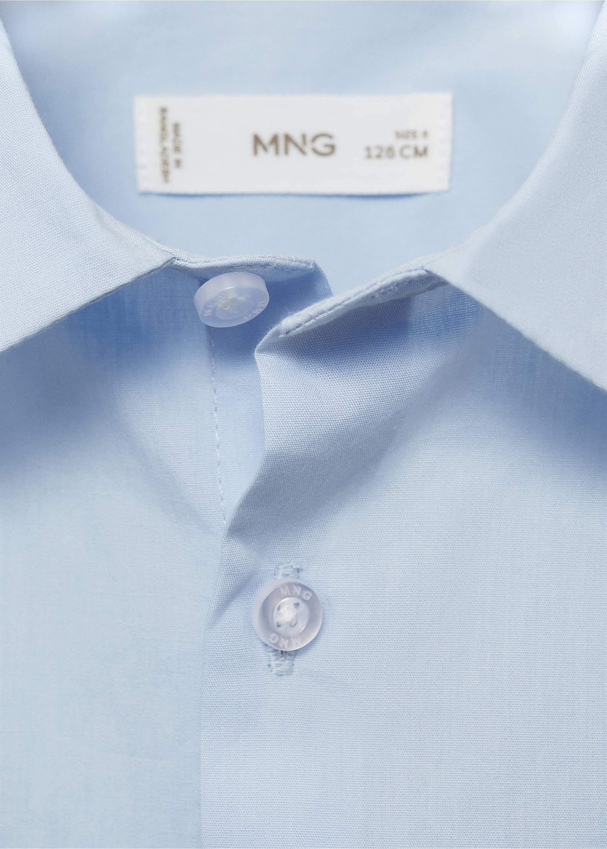 Close-up of a light blue children's shirt collar and button placket., Sky Blue. Ref: 17095795-00.