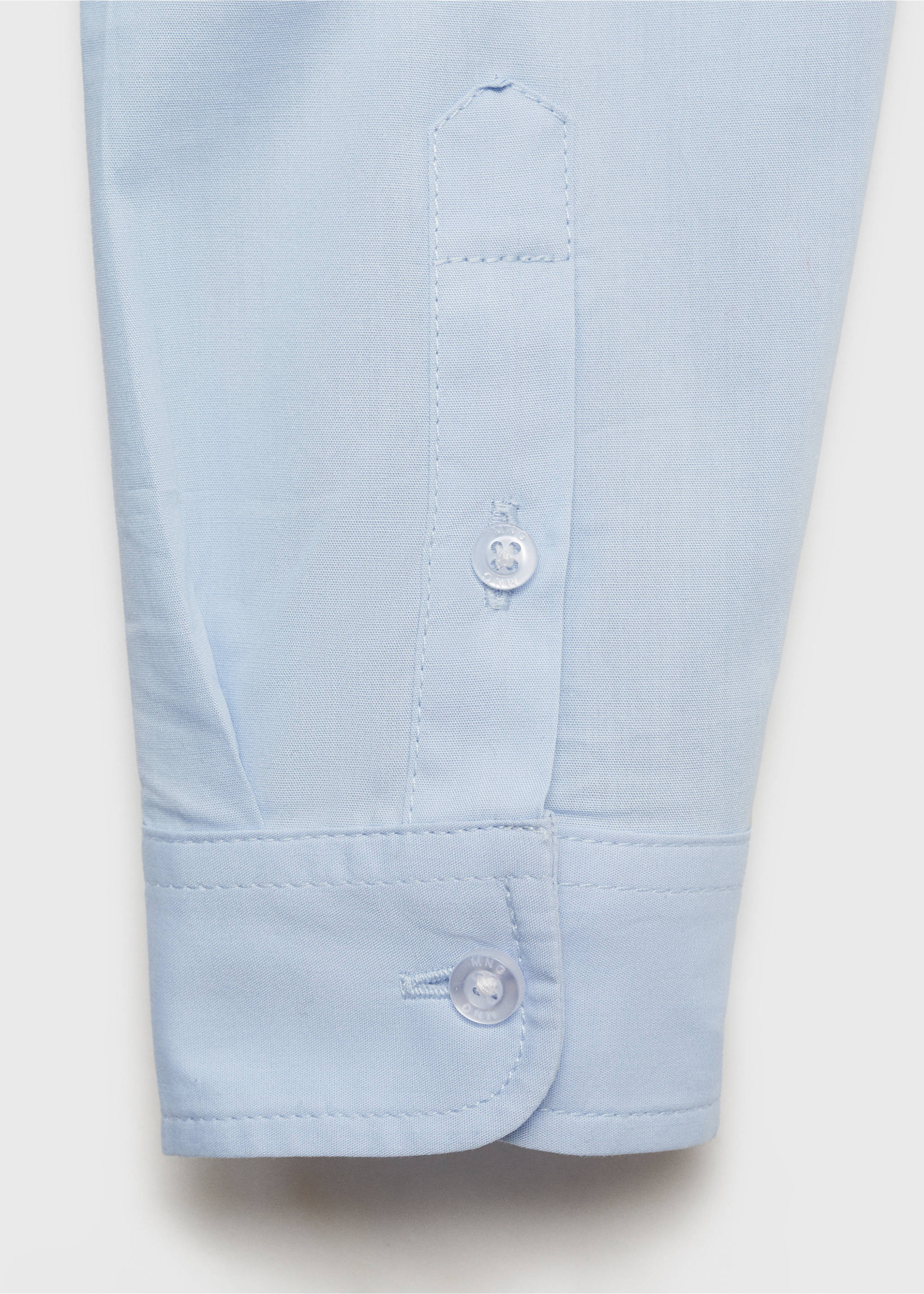 Close-up of the light blue kid's shirt cuff with button detail., Sky Blue. Ref: 17095795-00.