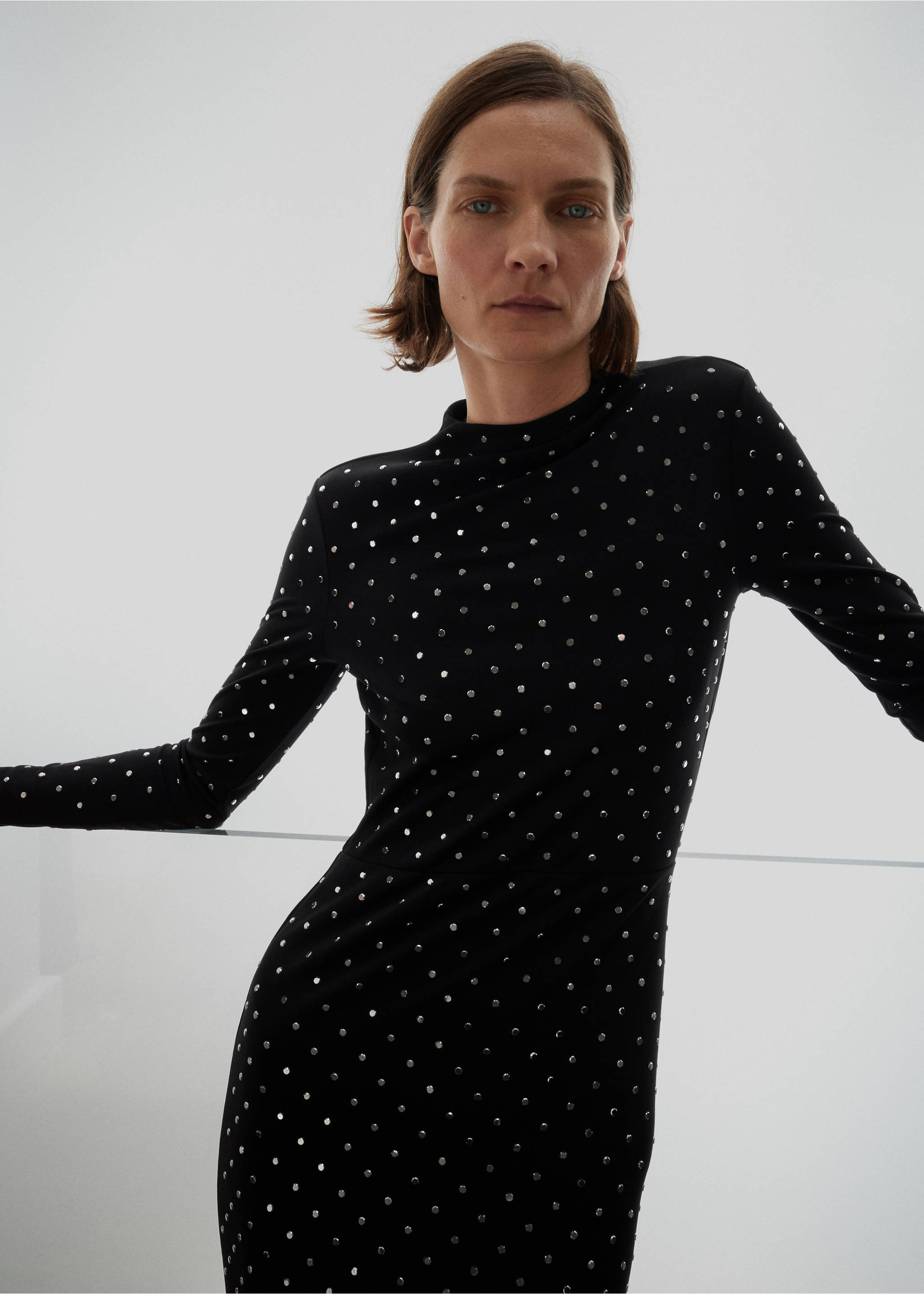 Black long-sleeved dress with metallic silver studs and high neckline., Black. Ref: 17096356-00.