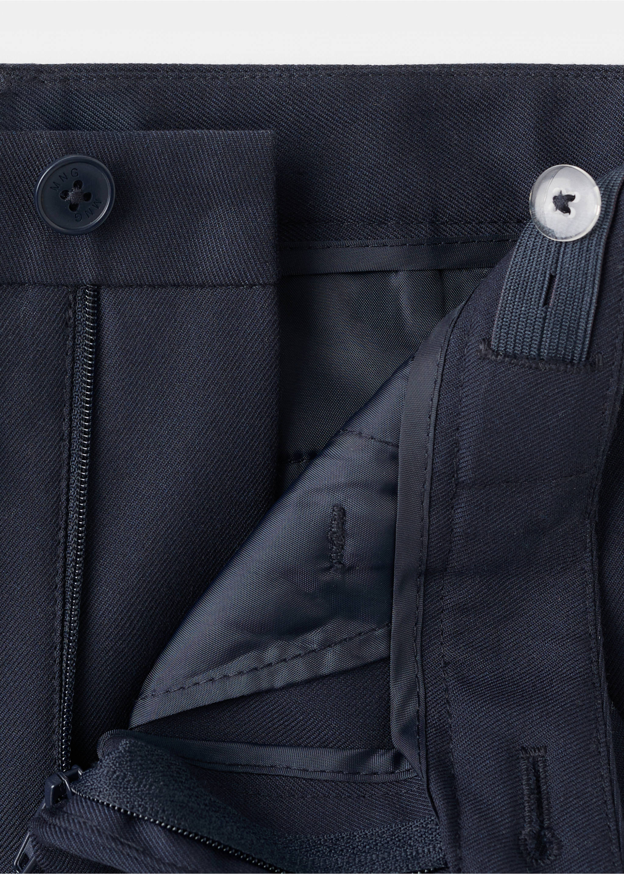 Close-up of navy blue kids' trousers showing the fabric texture and waistband details., Dark Navy. Ref: 17097759-00.