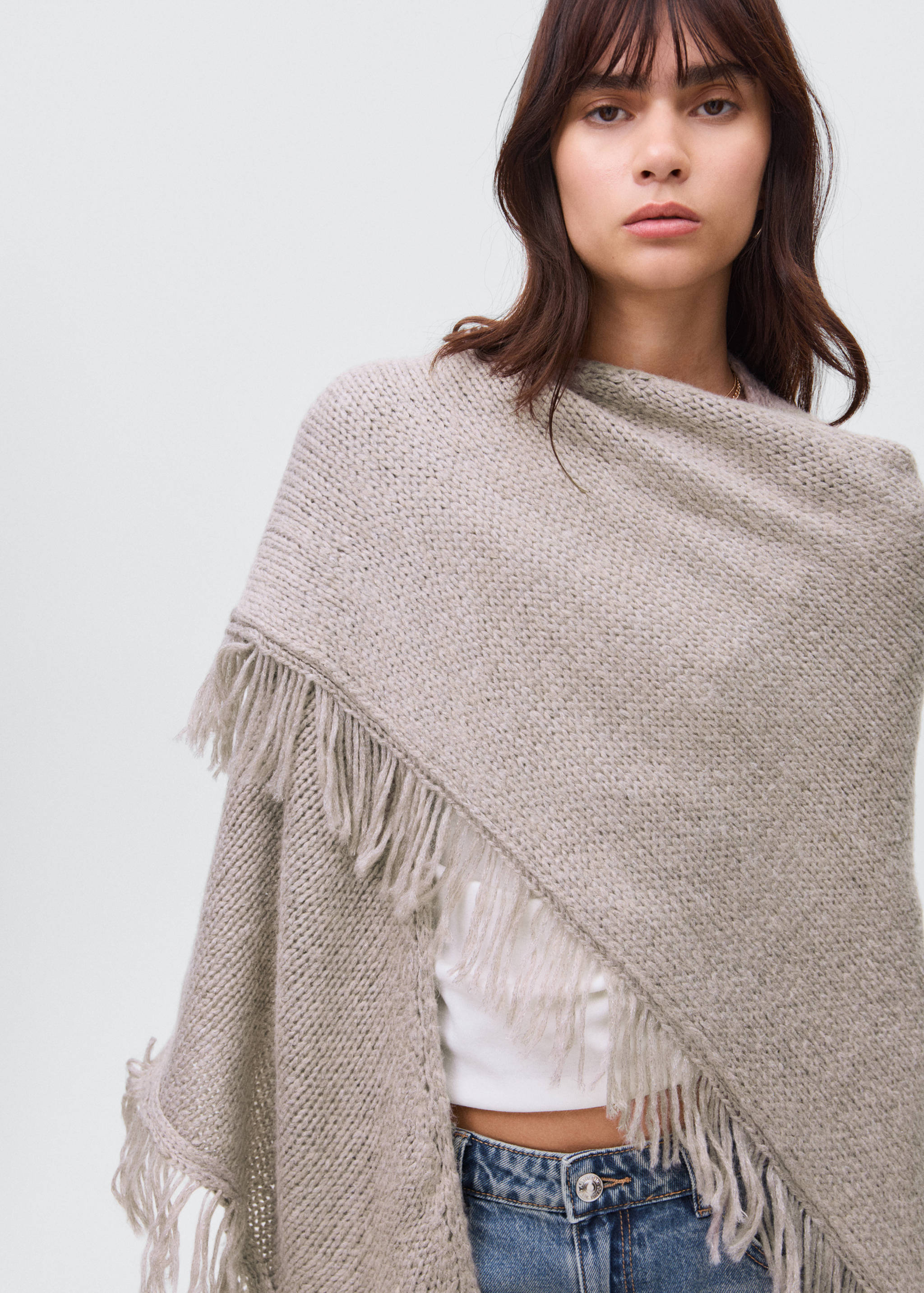 Knitted poncho with tassels - Details of the article 1