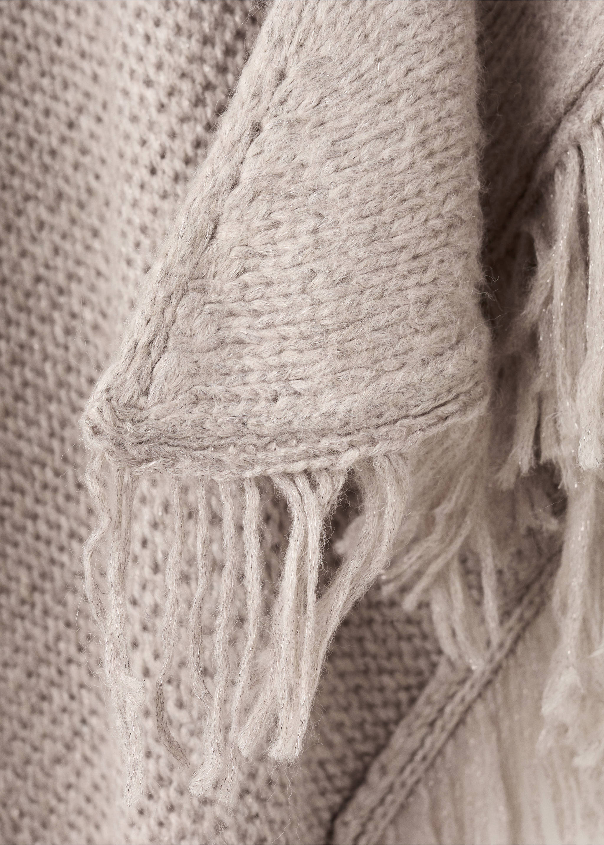 Knitted poncho with tassels - Details of the article 8, Light/Pastel Grey. Ref: 17098276-00.