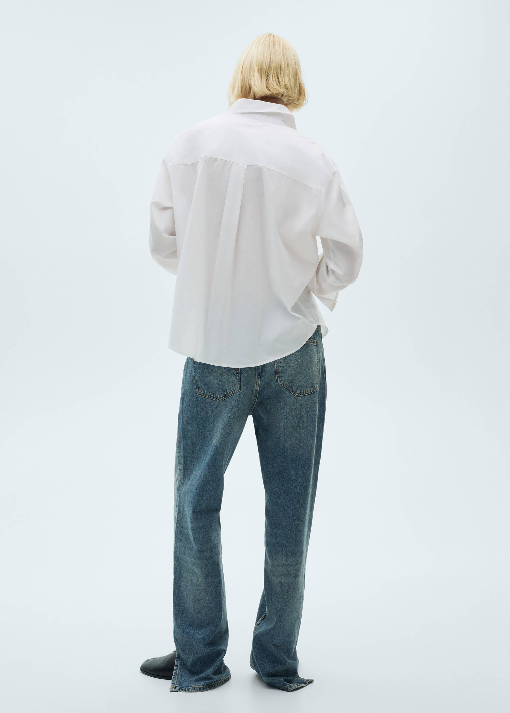 Cotton shirt with decorative button - Reverse of the article